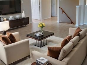 Virtually staged game room showing potential as a second living room