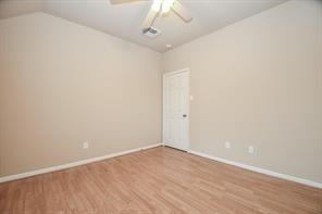 One of the spacious secondary bedrooms upstairs, all with ample closet space