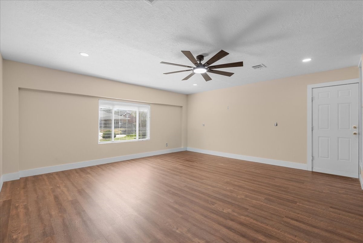 Garage converted to flex room, window added for lots of natural light.