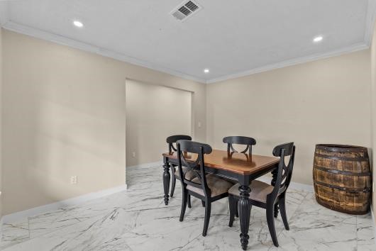 Formal dining area , modern, freshly painted, cozy and bright.
