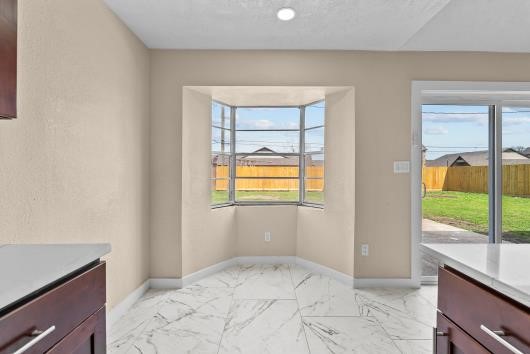 Bay windows and patio doors, makes slipping outside on cool mornings the perfect coffee perk. Bay windows and patio doors, makes slipping outside on cool mornings the perfect coffee perk.