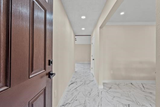 Front door opens to foyer with breathtaking views of formal living area and family room.
