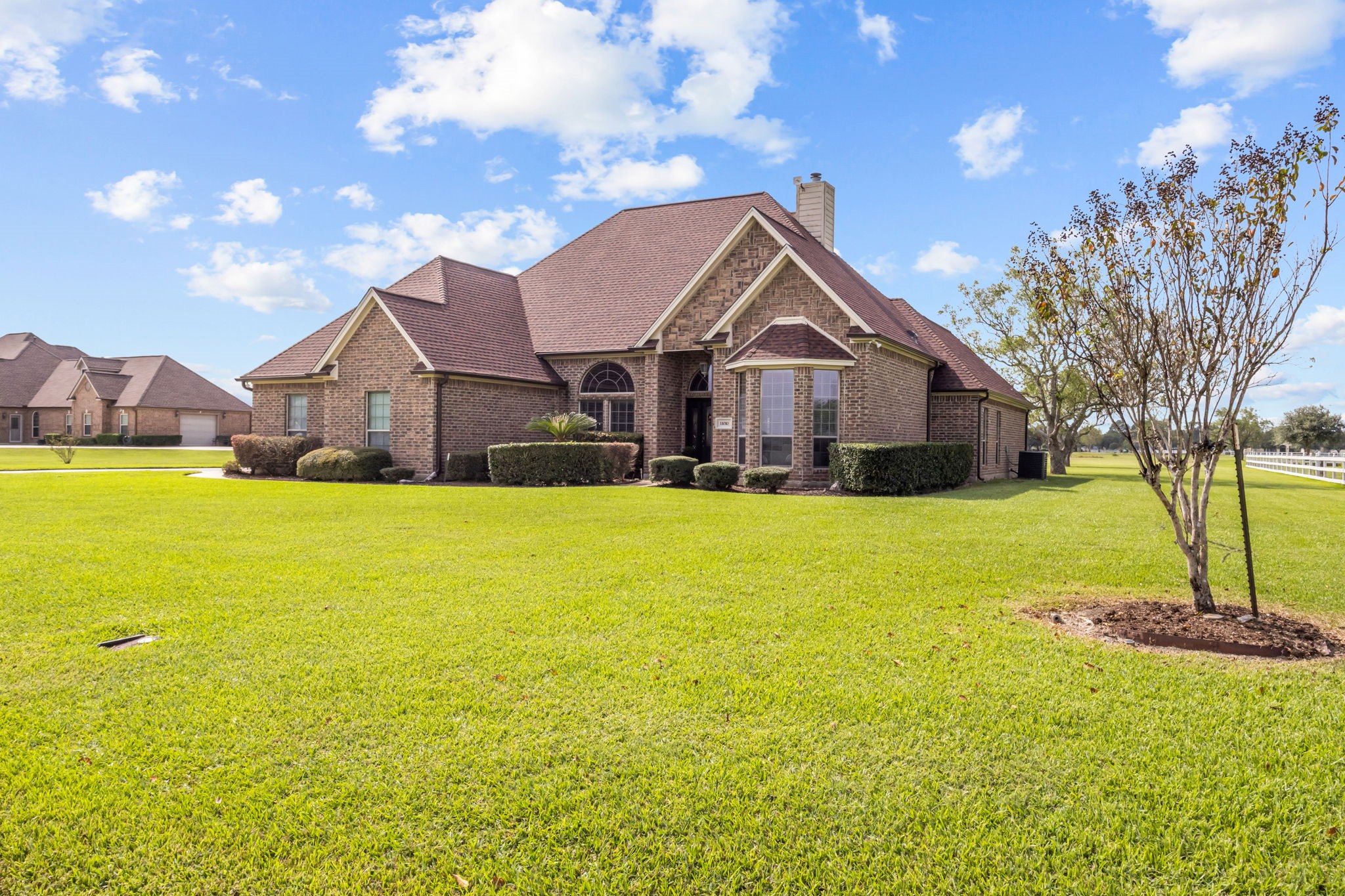 Timeless curb appeal meets wide open spaces! This beautiful brick home features a striking roofline with a new roof installed in 2024, manicured landscaping, and a welcoming entrance. Set on over 2 acres, this property offers the perfect blend of charm, space, and country-style living.