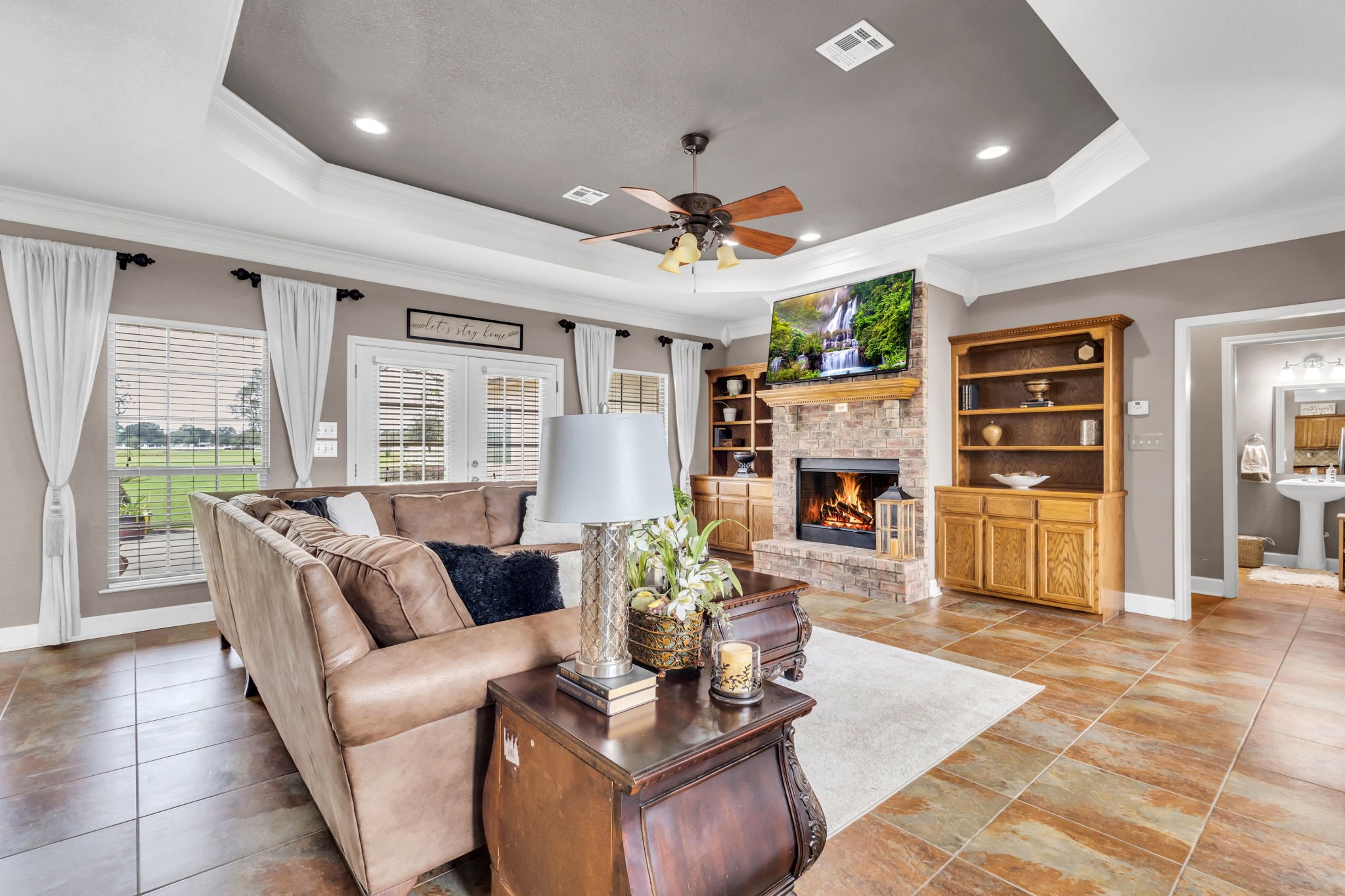 Expansive living area designed for both everyday comfort and entertaining, offering generous seating space, an open layout, and easy access to the outdoor living area. A perfect blend of functionality and inviting design.