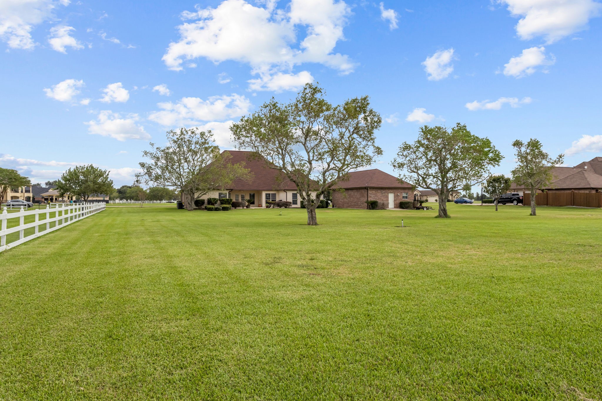 Situated on over 2 acres, this expansive backyard offers mature shade trees, a beautifully maintained lawn, and plenty of room to add a swimming pool. Enjoy the open space and endless possibilities for outdoor entertaining, recreation, and creating your own backyard retreat.