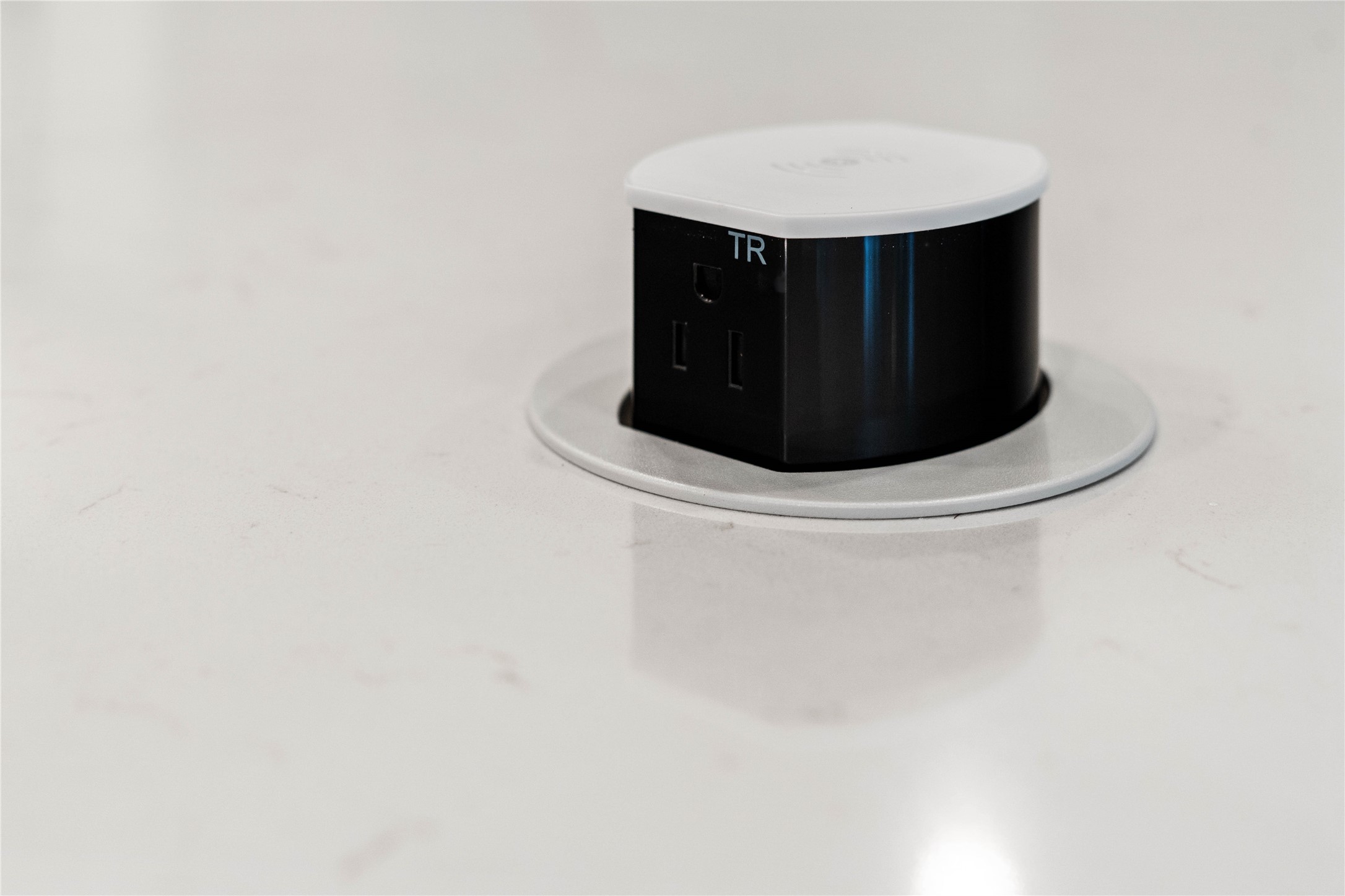 Thoughtful modern luxury meets ultimate convenience with this sleek, flush-mount pop-up countertop outlet. Keep your expansive kitchen island pristine and completely clutter-free while cooking, entertaining, or working from home.
