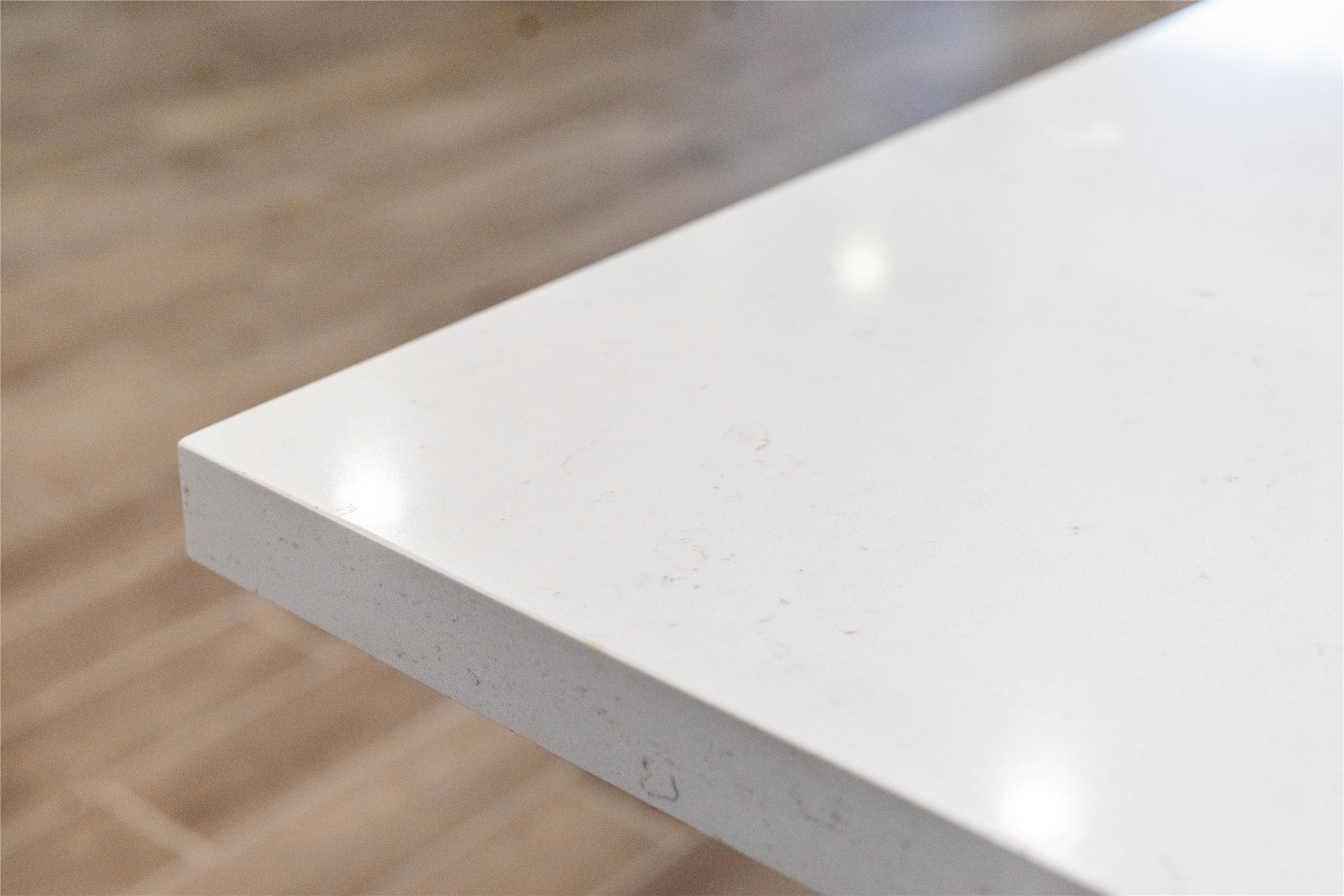 Crisp white quartz countertops complete the contemporary design, offering a stylish and highly functional workspace for any homeowner.