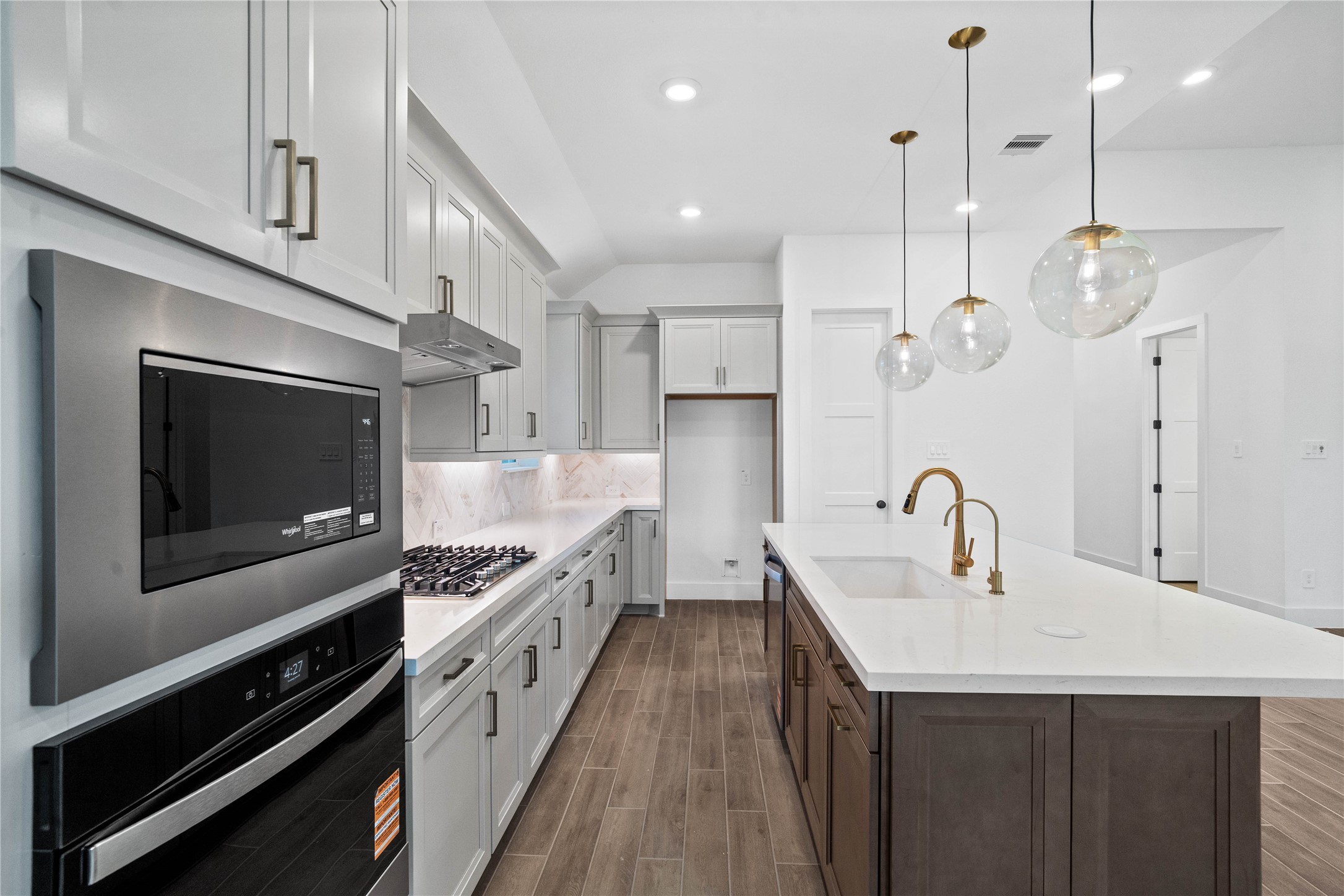 Additional view from dining room - highlighting a different perspective of the kitchen.