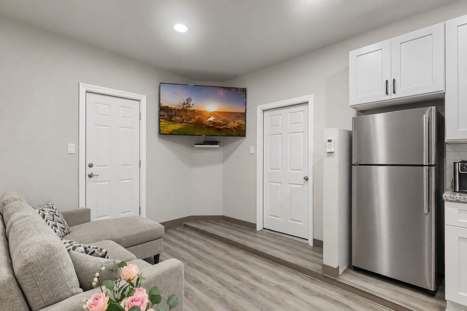 Concept rendering showing a possible private-entry configuration for the converted garage living area. Rendering depicts potential modifications and is not the current condition.