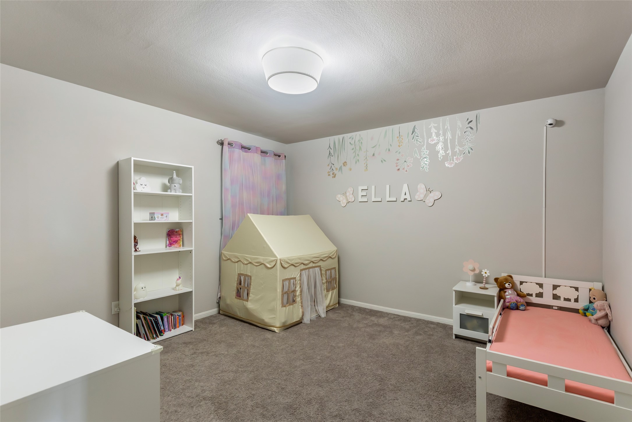 Spacious secondary bedroom offers flexibility for family, guests, a home office or hobby space.