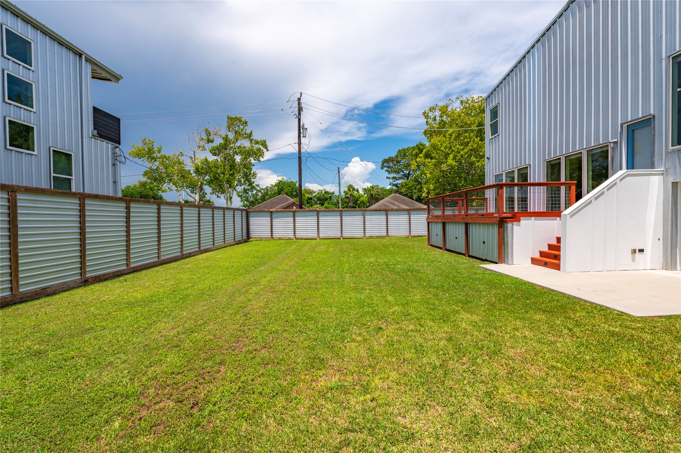 8' tall fencing made from cedar, exterior pine, and metal.