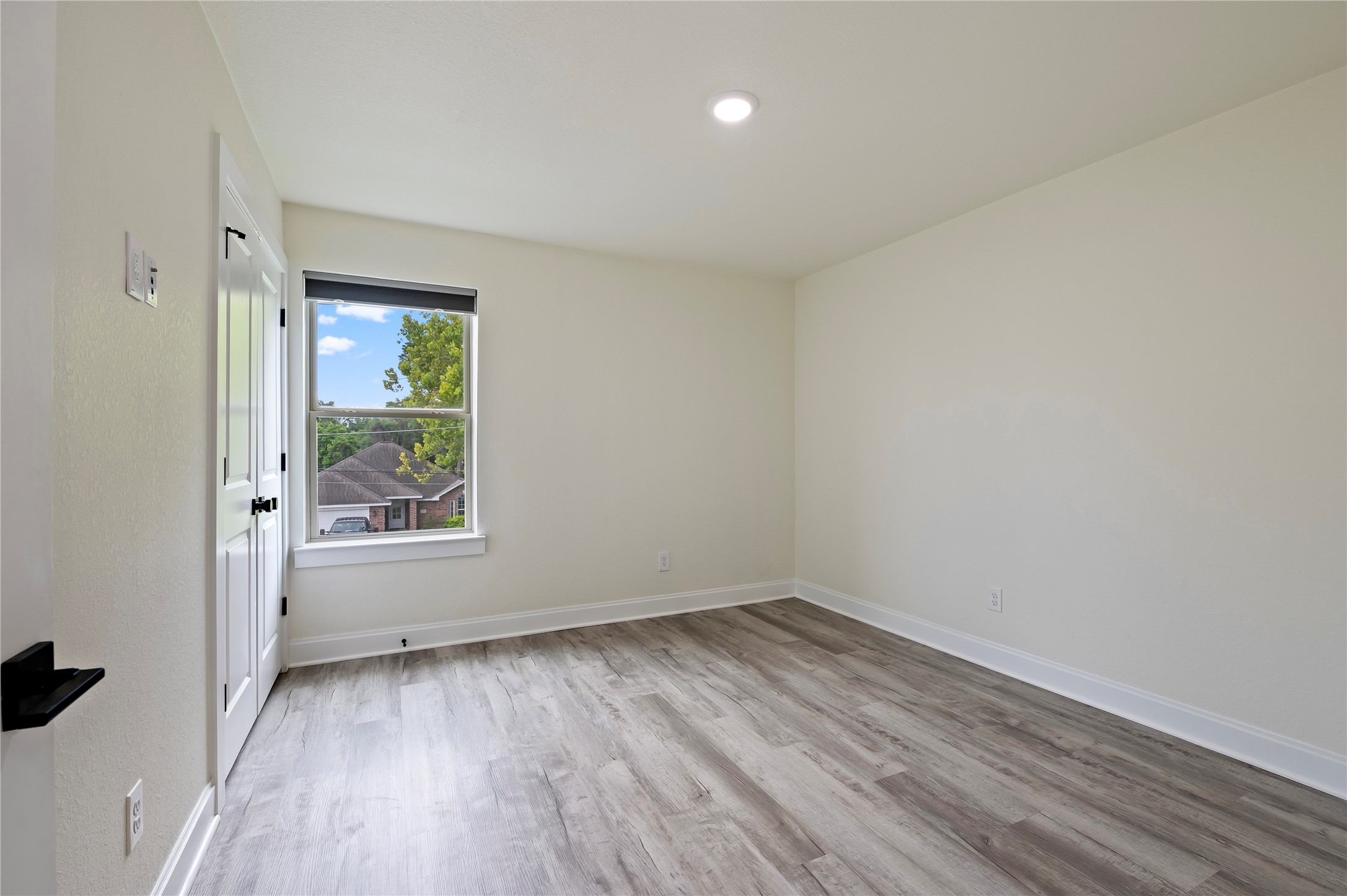3rd bedroom is also spacious with vinyl plank flooring and large closet space.