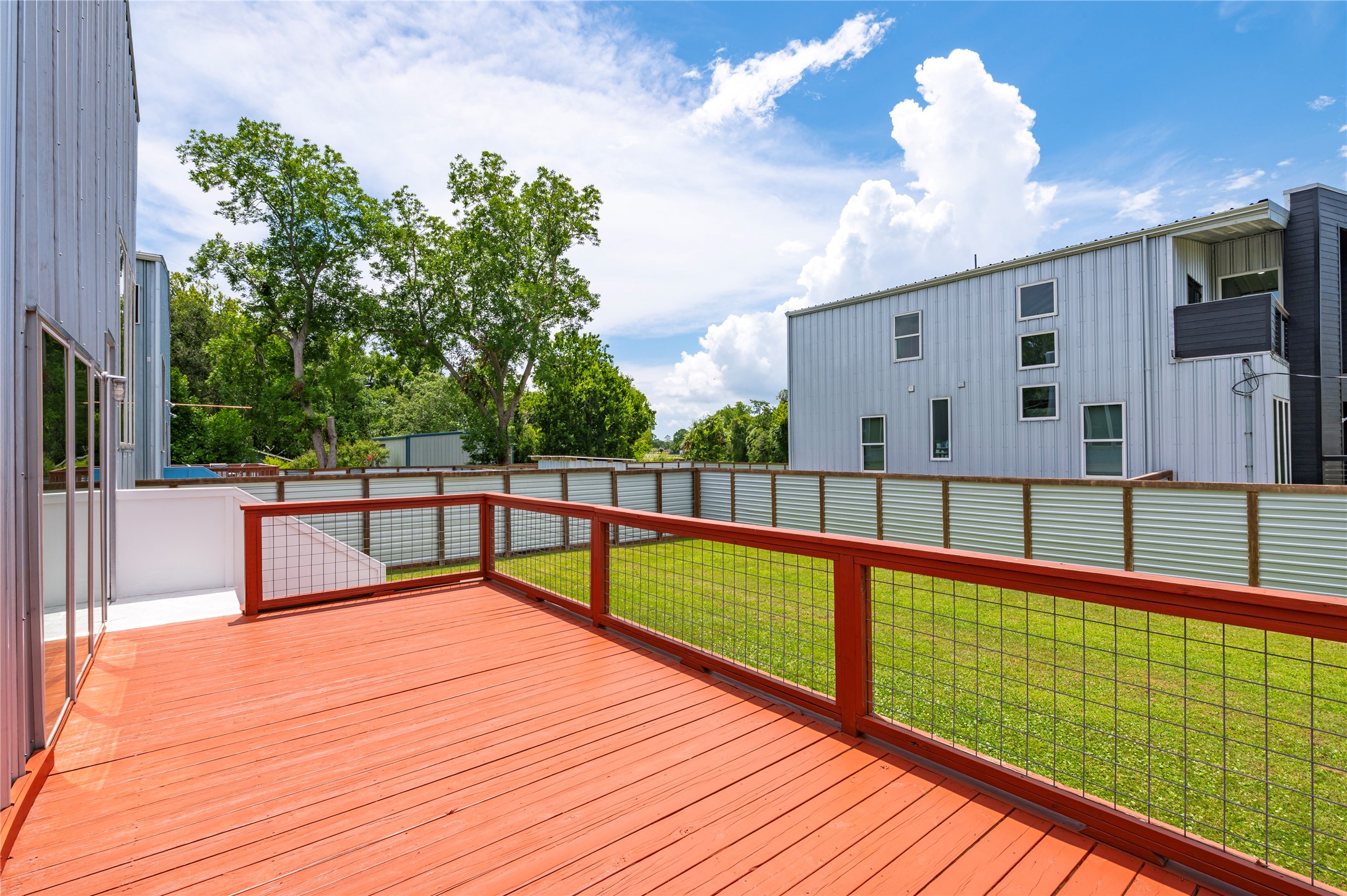 Ample entertainment space; large deck over looking backyard.