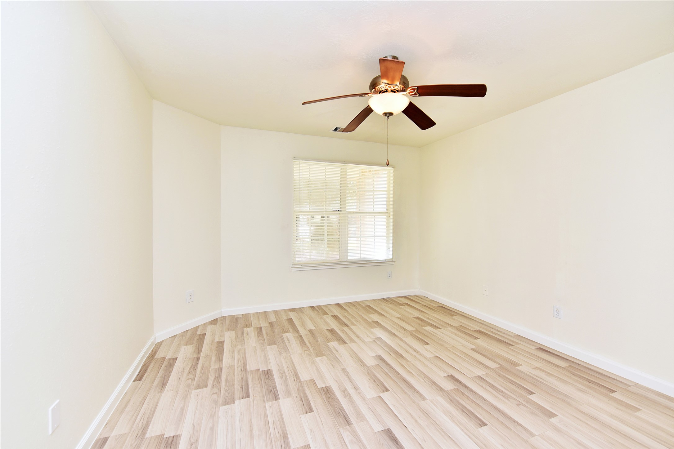 The primary bedroom. All the flooring in this home is LVP or tile. There is no carpet.