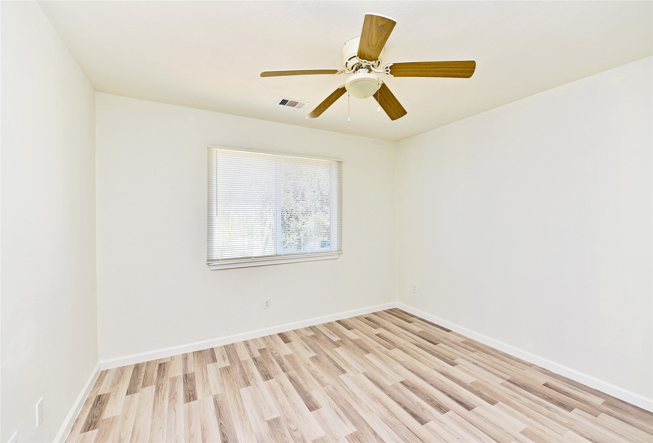 One of the secondary bedrooms.