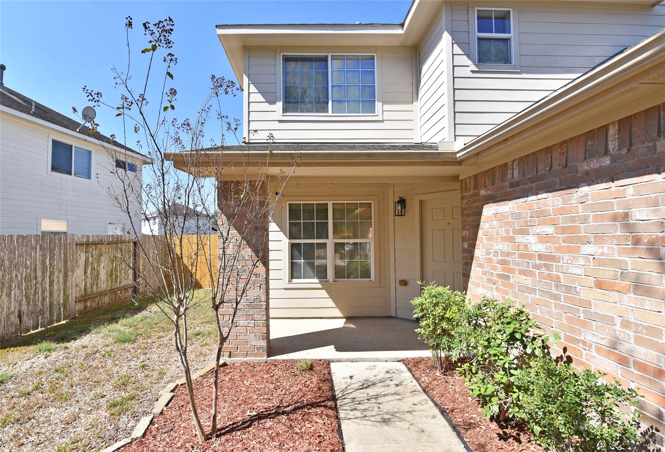 This porch as plenty of room for a nice rocking chair to wave at the neighbors.
