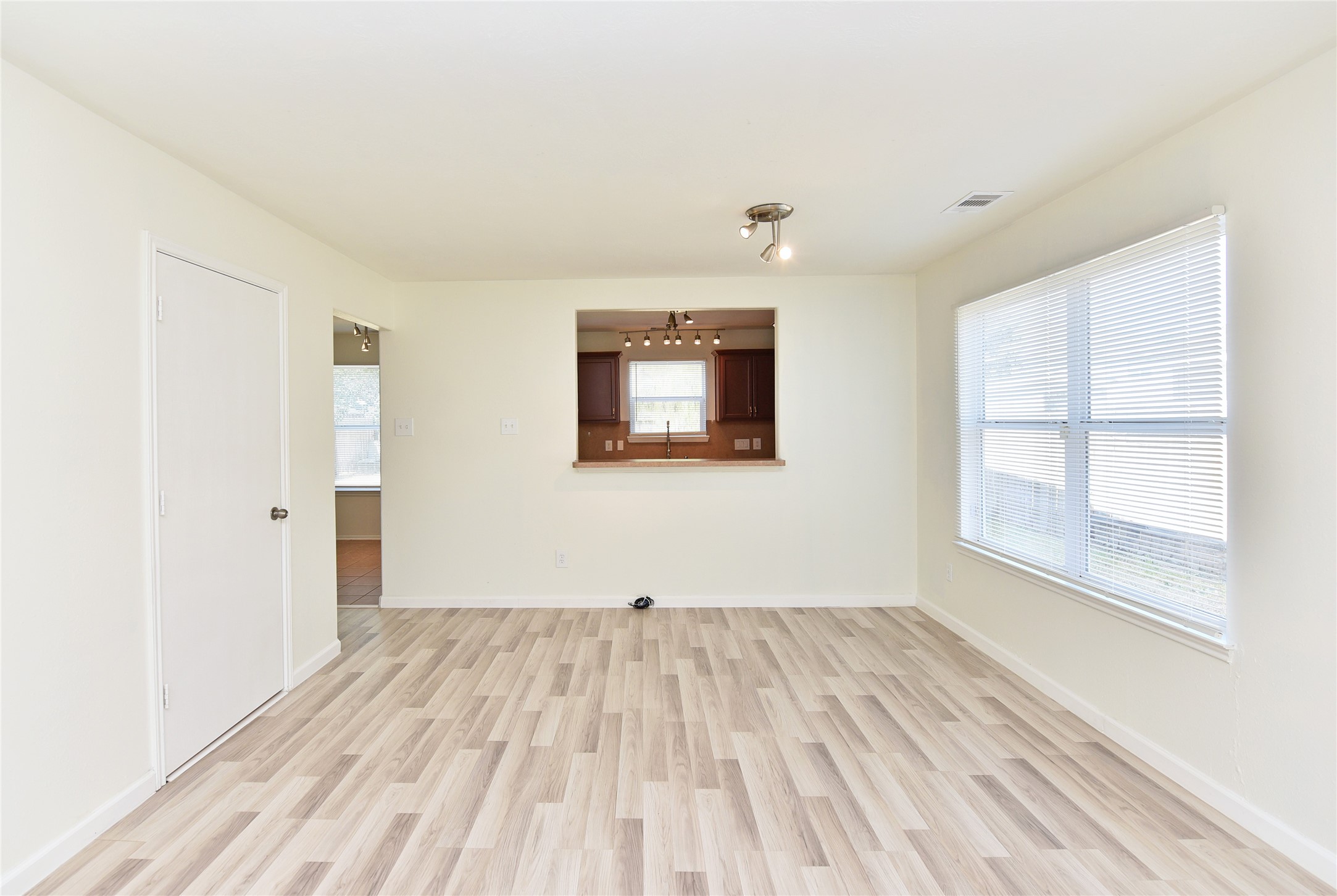This view of the family room shows the breakfast bar looking into the kitchen.