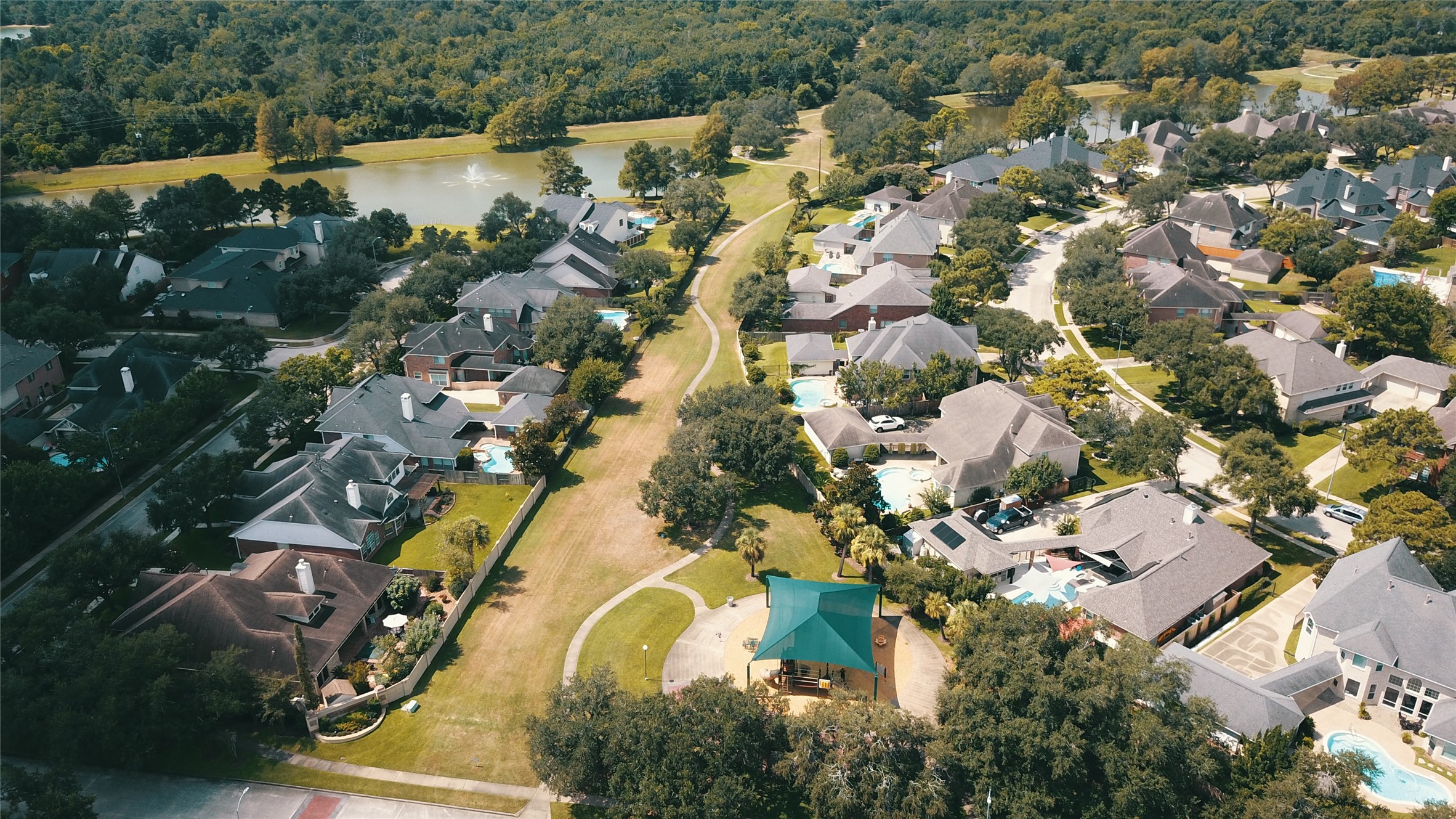 A charming playground nestled next to scenic lakes, perfect for family fun and relaxation.