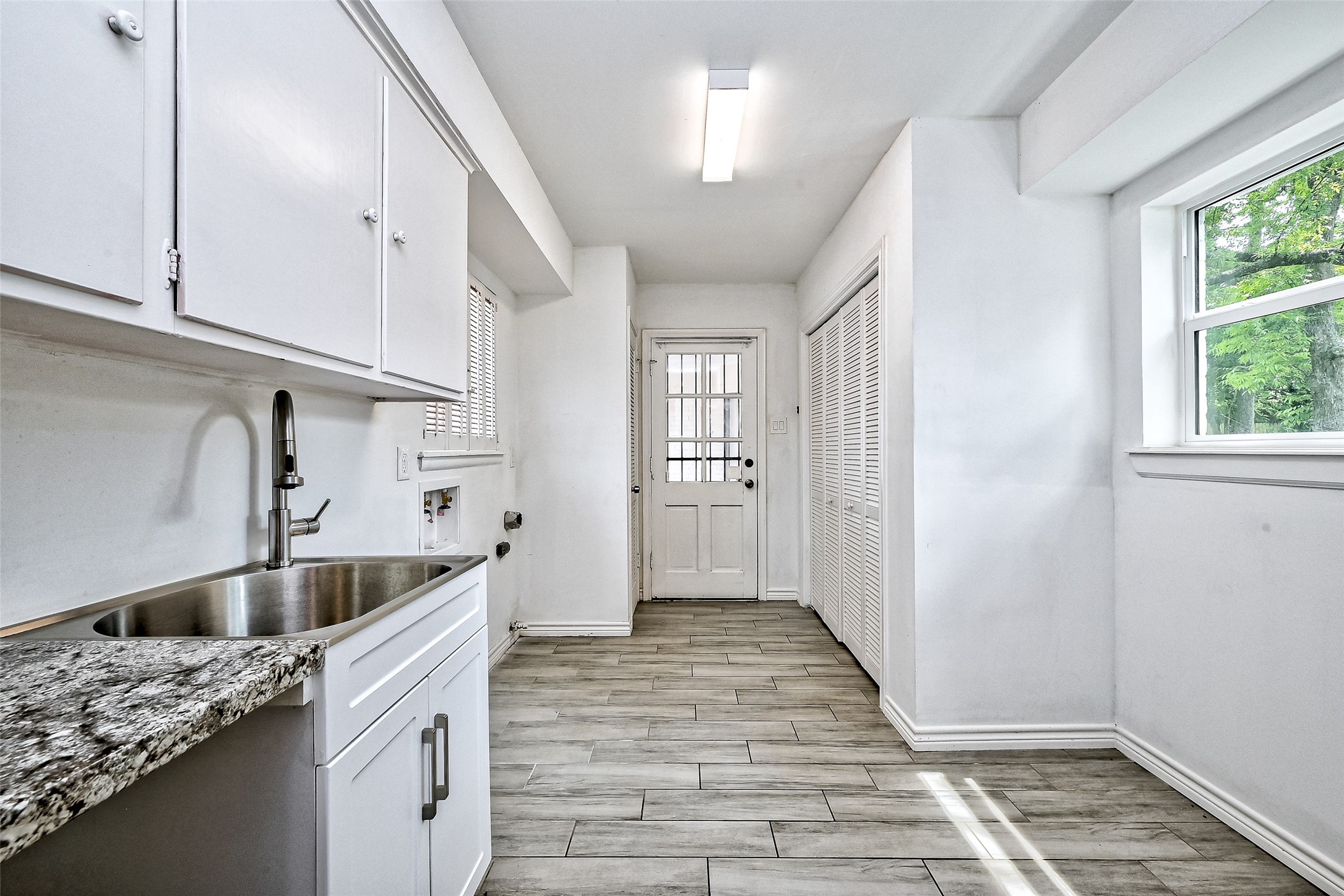 Utility room with large washing basin for your convenience