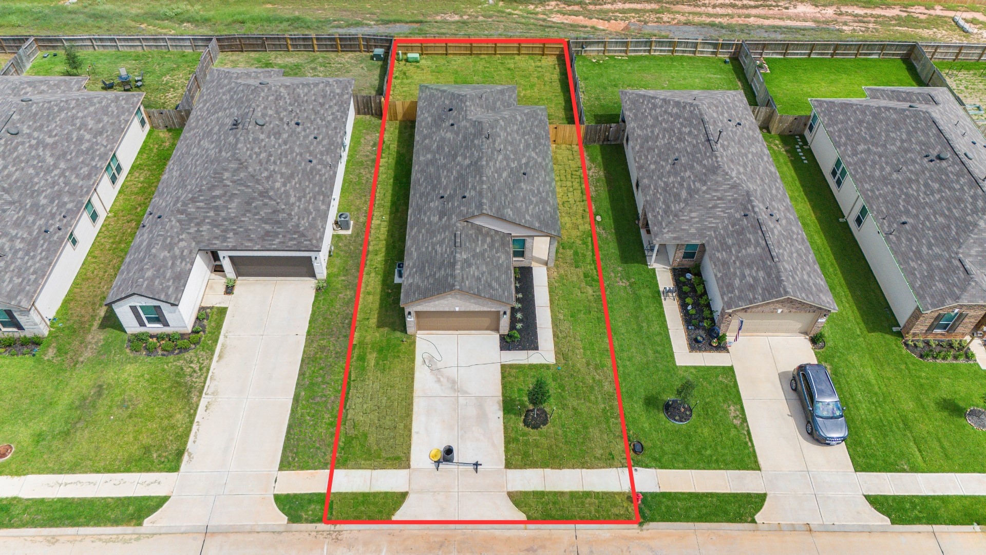 Amazing aerial shot of this gorgeous KB Home home situated on a large lot with NO BACK NEIGHBORS, ample yard space in front and the back, lush landscaping and well-maintained yard!