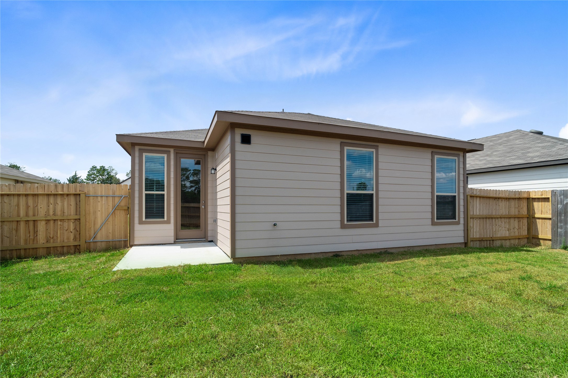 Come and see this spacious backyard. There is plenty of room for the kids to play and adults to relax!