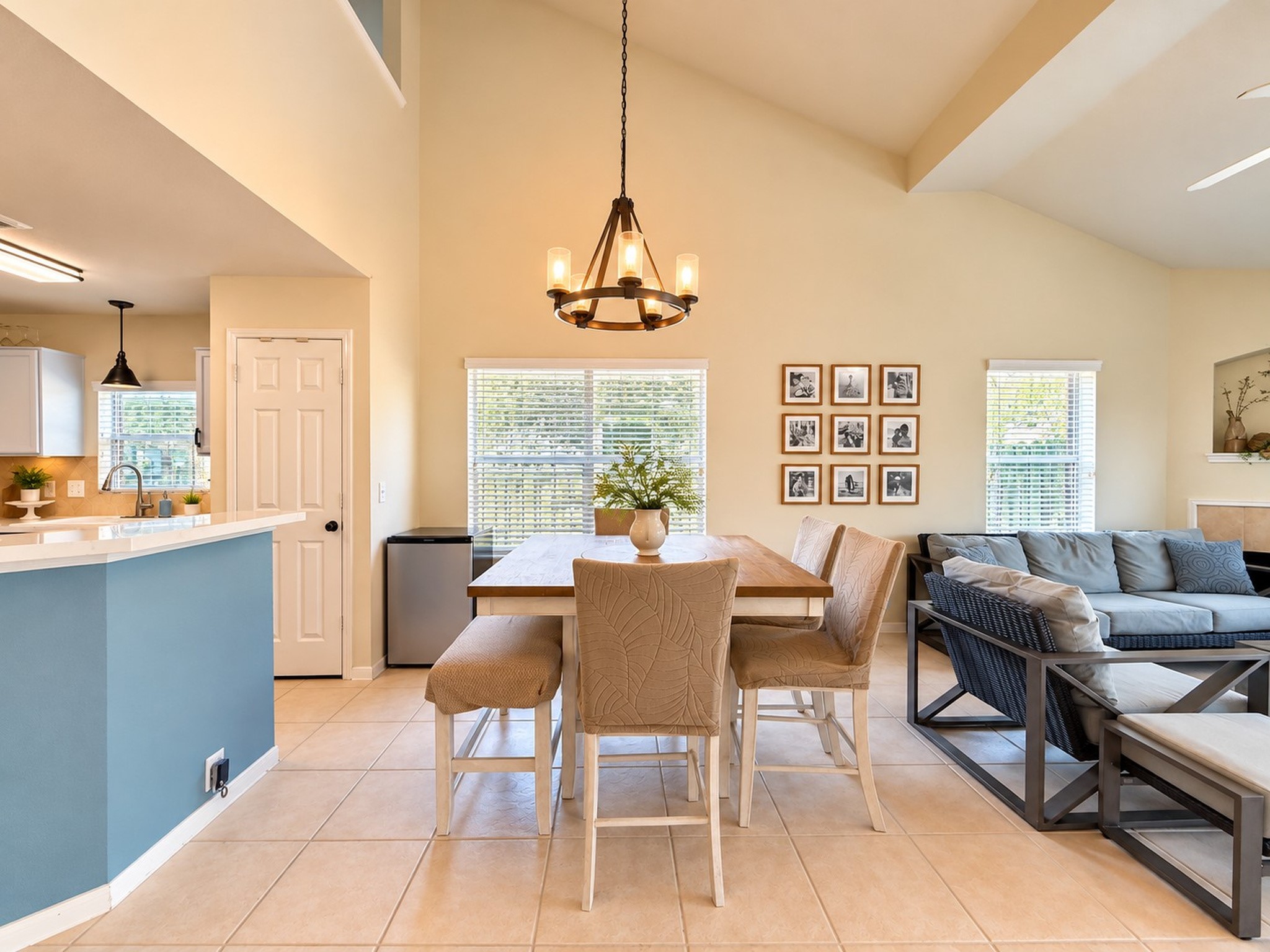 Dining Room has a dramatic vaulted ceiling & new lighting