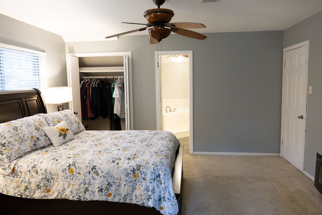 Retreat to the spacious owner's suite, featuring his-and-her closets and plenty of room for a king-size bedroom set with space to spare. Designed for comfort and relaxation, this inviting retreat offers the perfect place to unwind at the end of the day.