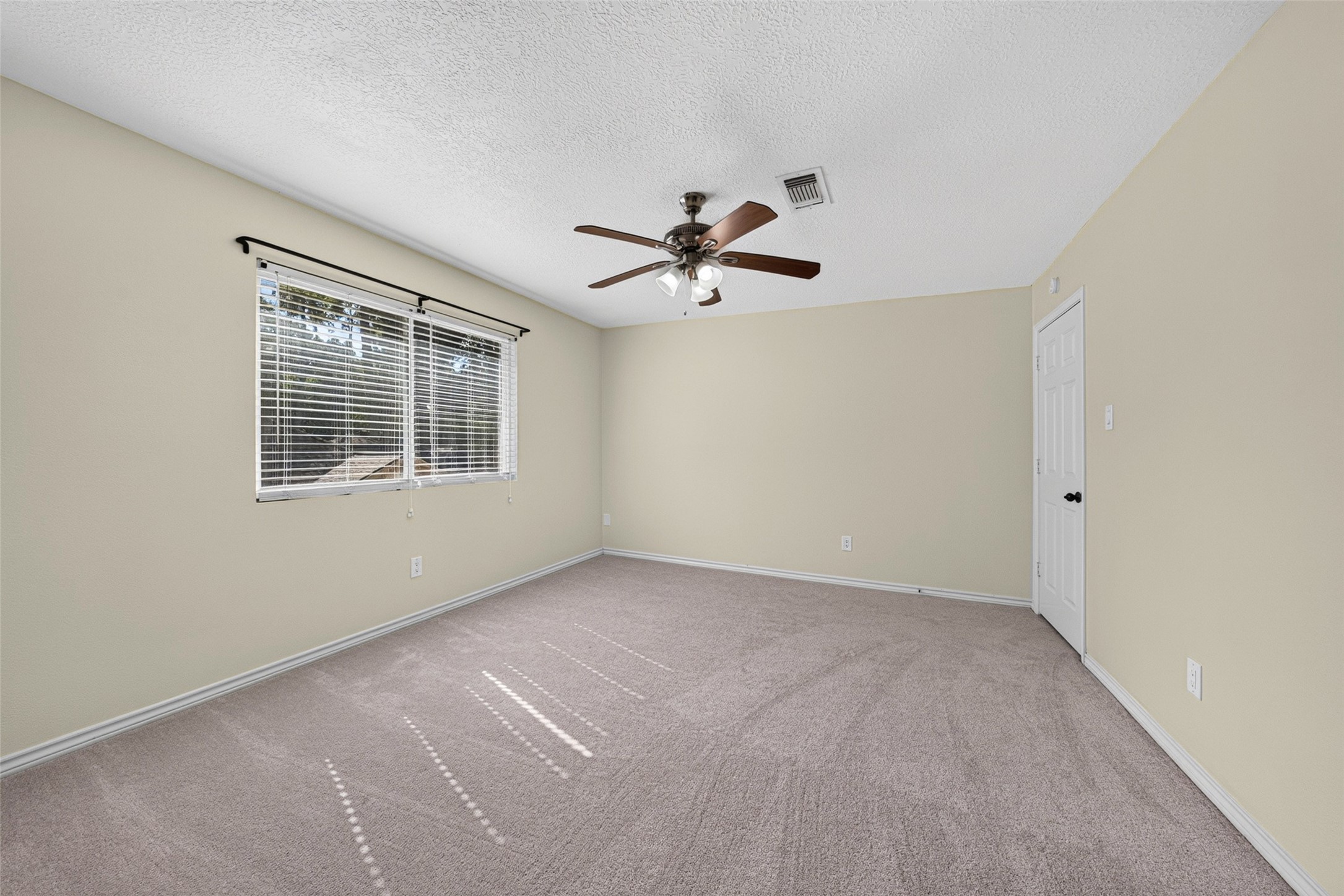 All bedrooms as well as the breakfast room and living room have ceiling fans.