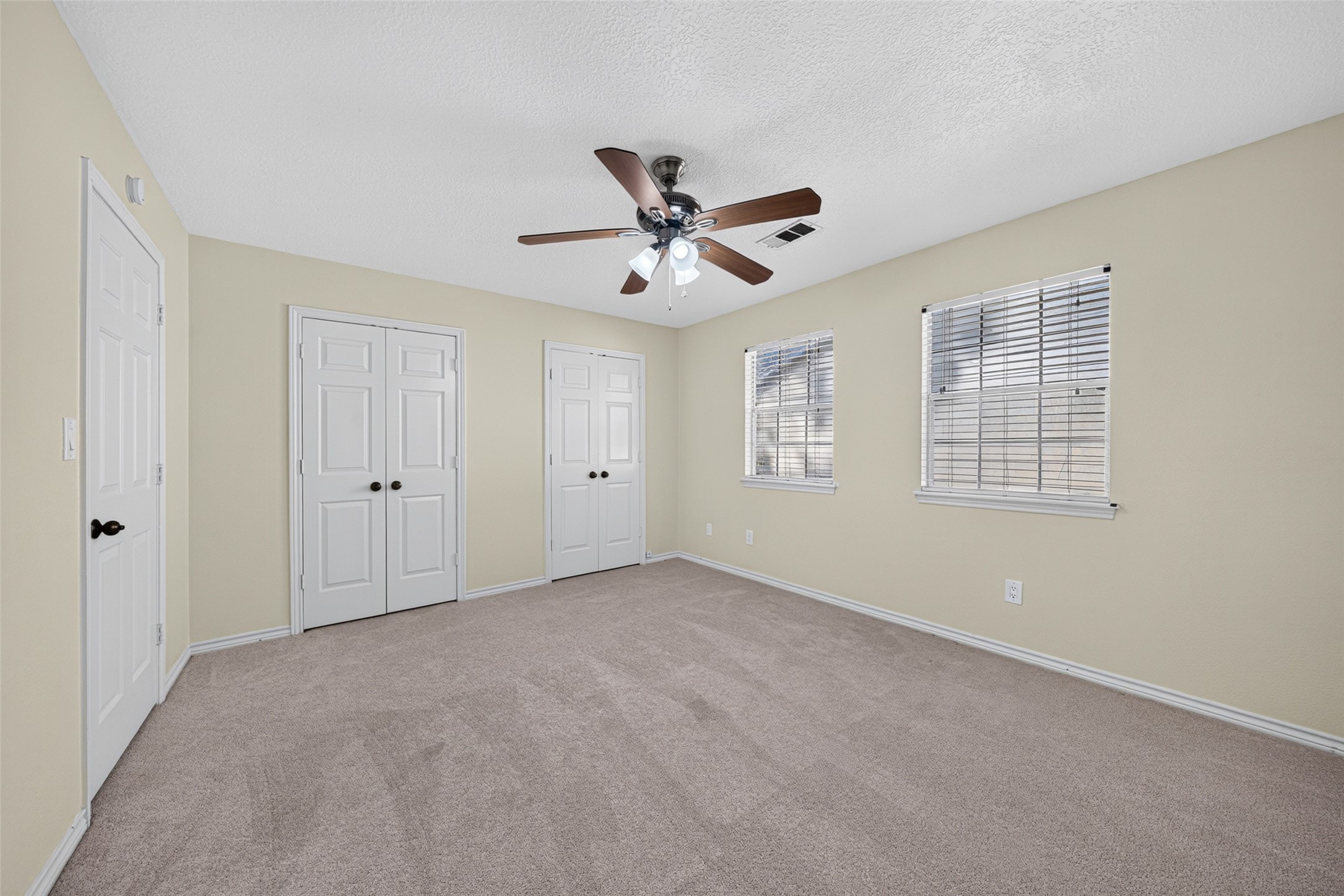 All upstairs rooms have adjustable window blinds.