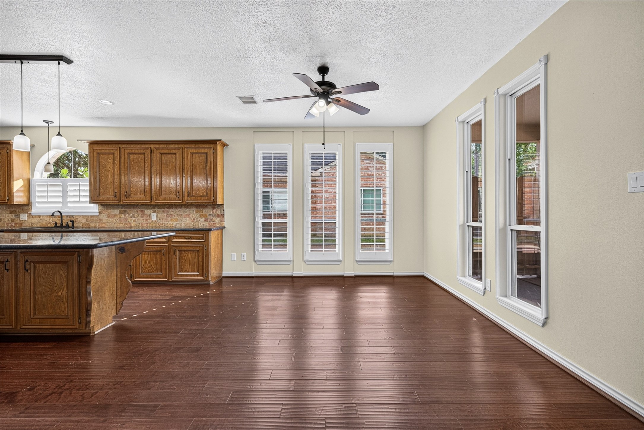 There is a generous breakfast room that connects the living room and the kitchen.