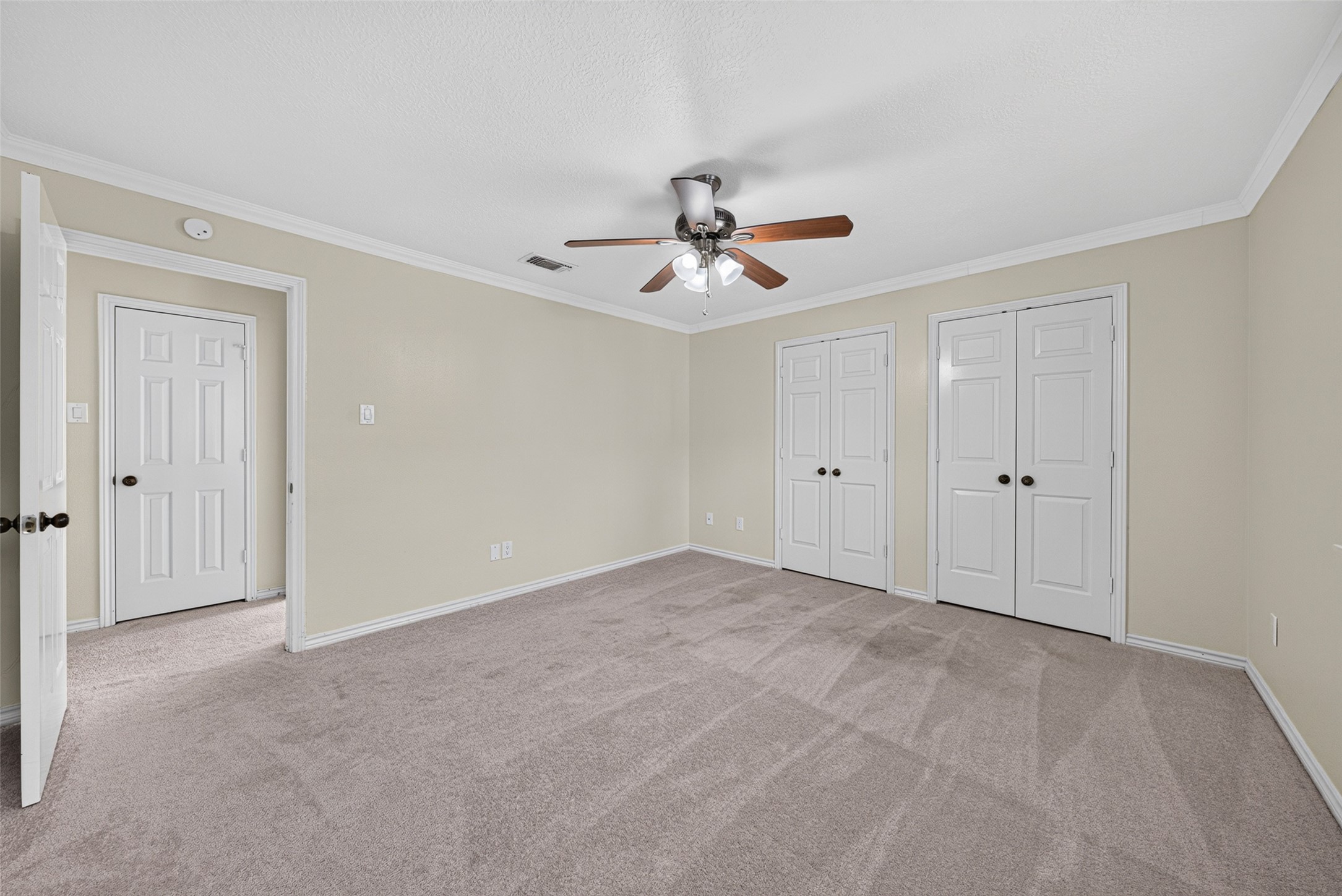 All secondary bedrooms are located upstairs and are carpeted.