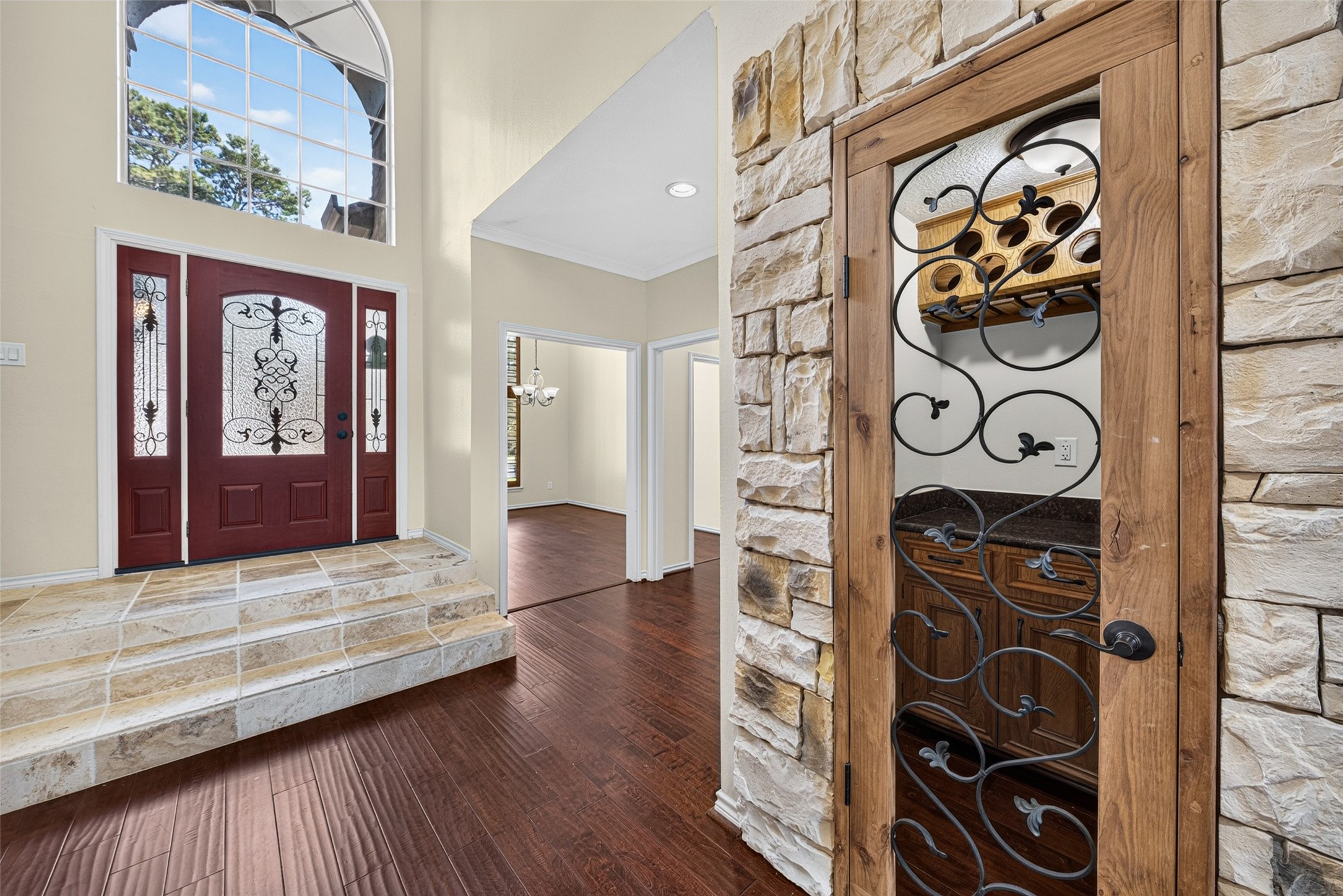 There is a custom enclosed dry bar nook between the living and dining rooms, great for entertaining.