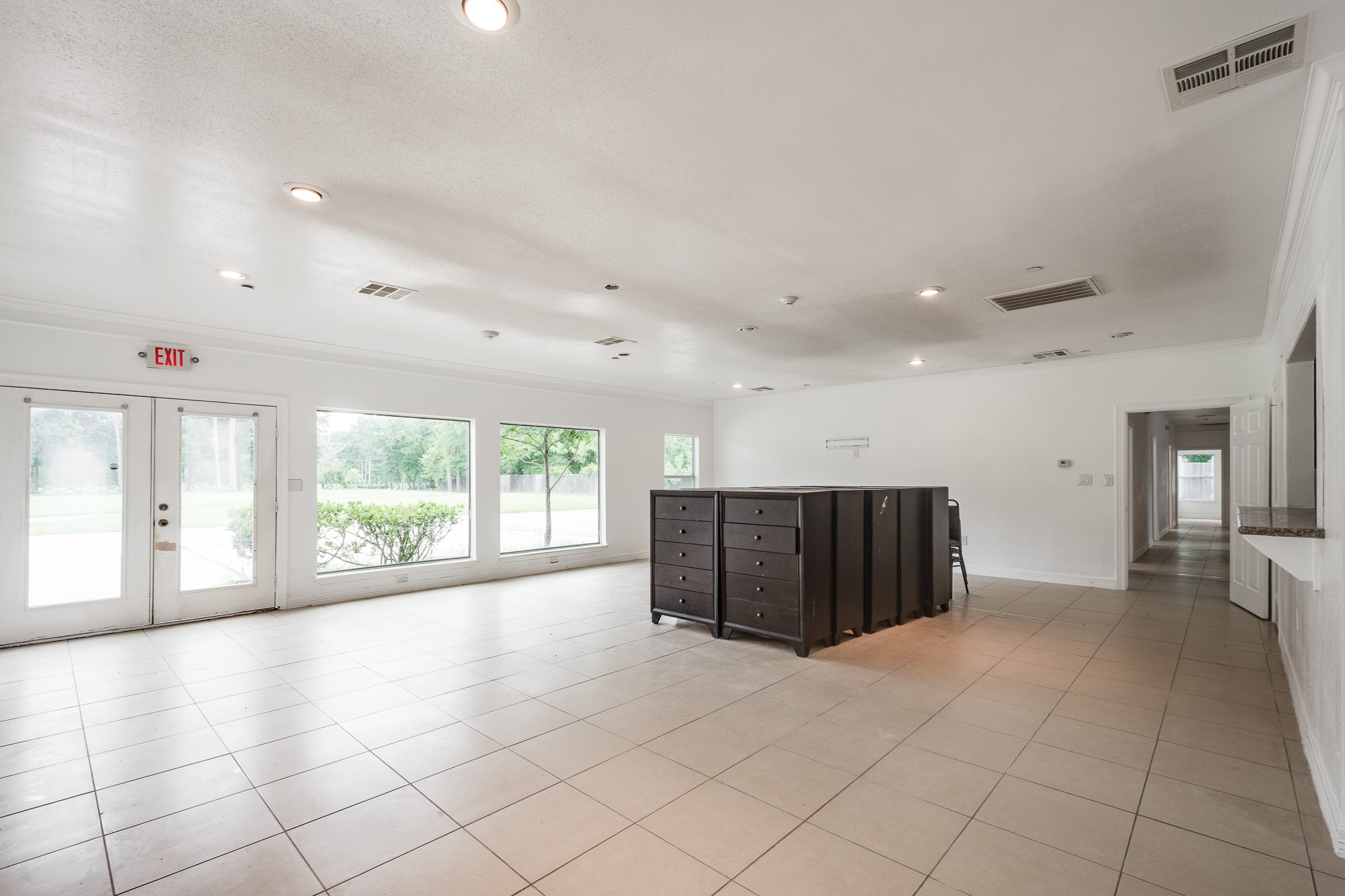 Building #2 with natural light and tile floors.