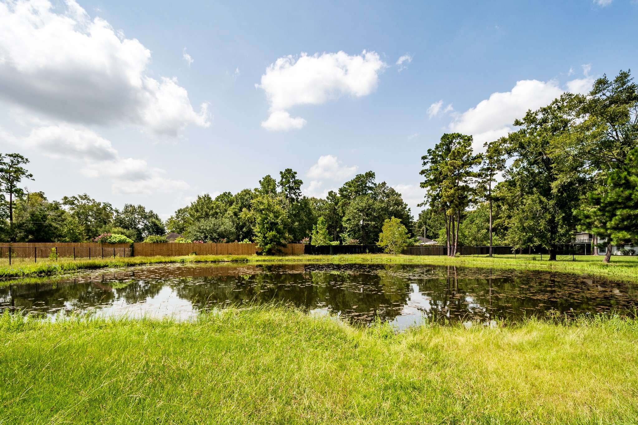 Pond located on south side of Porter Lane 8.5+/-Ac Tract w/ 6 buildings.