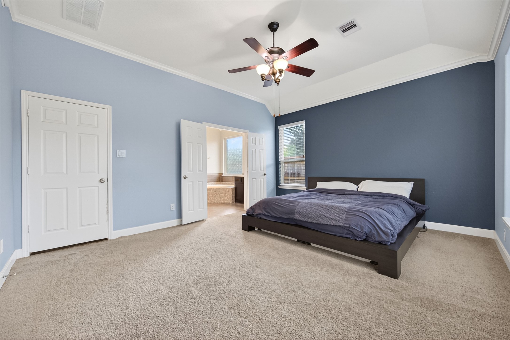 This bed is king size, so you can imagine what all you can fit inside this primary.