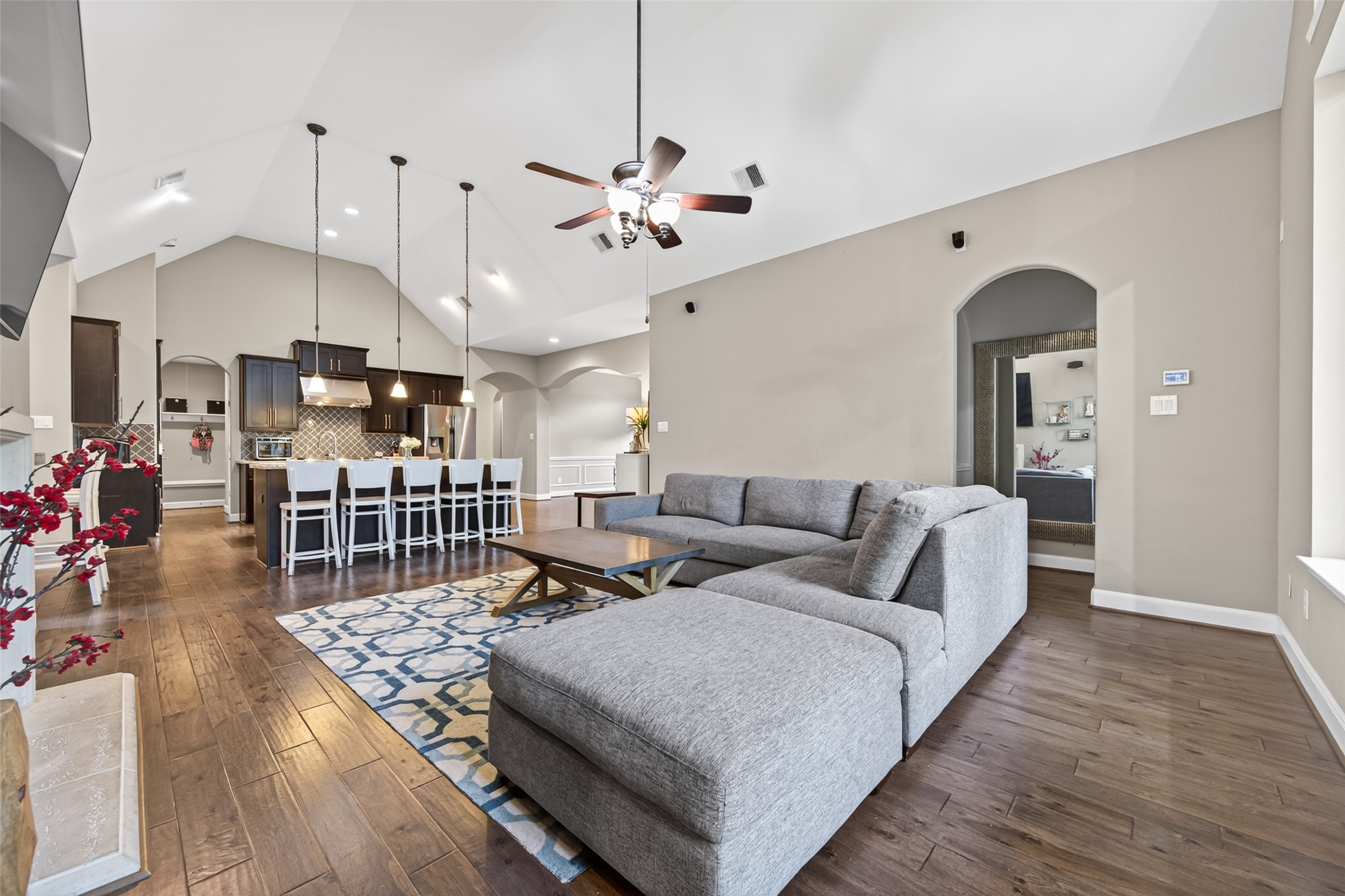 Through the corner of the room is the primary bedroom for easy access to the action.