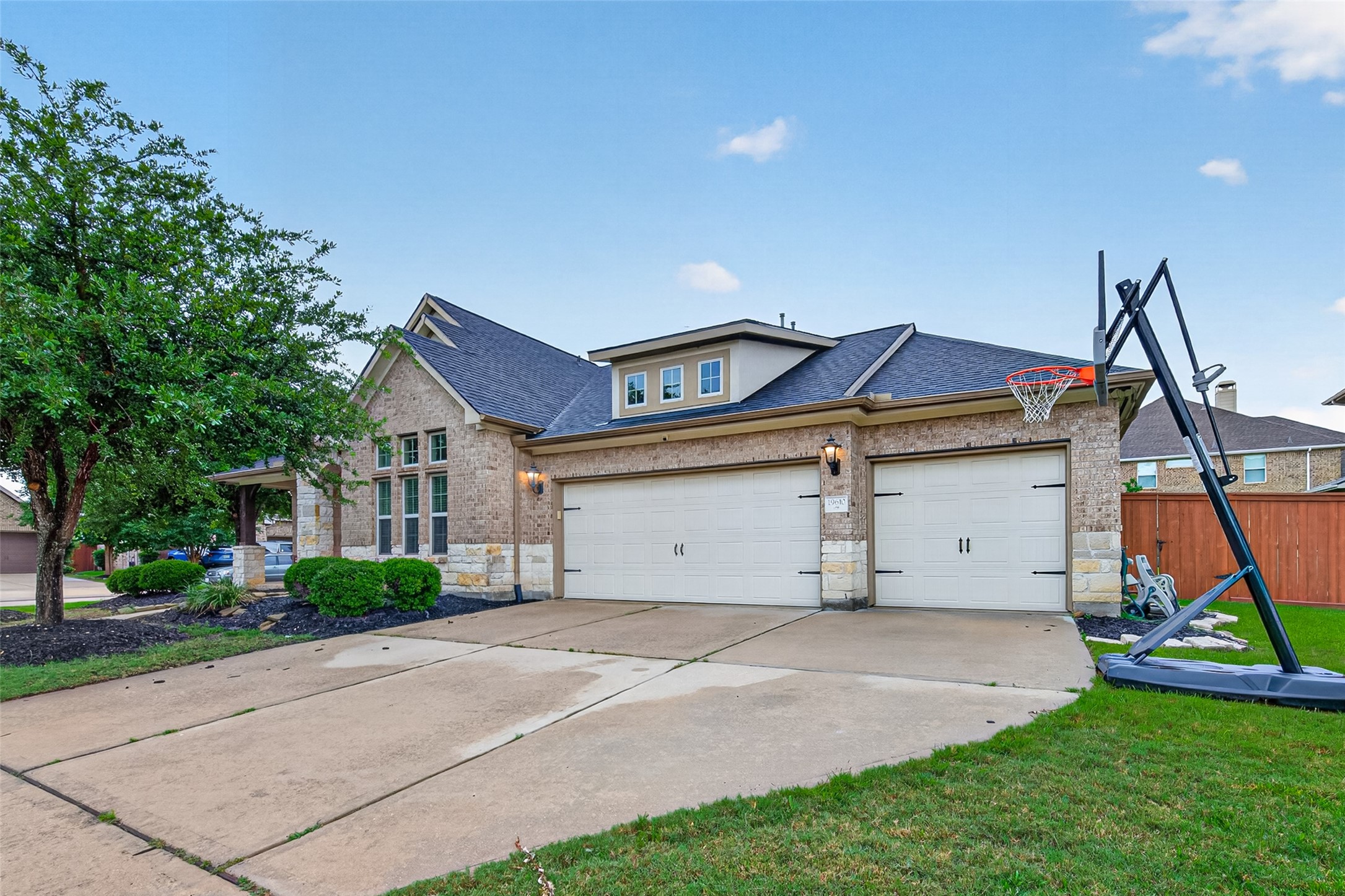 Sitting on an oversized corner lot allows having a 3 car garage.