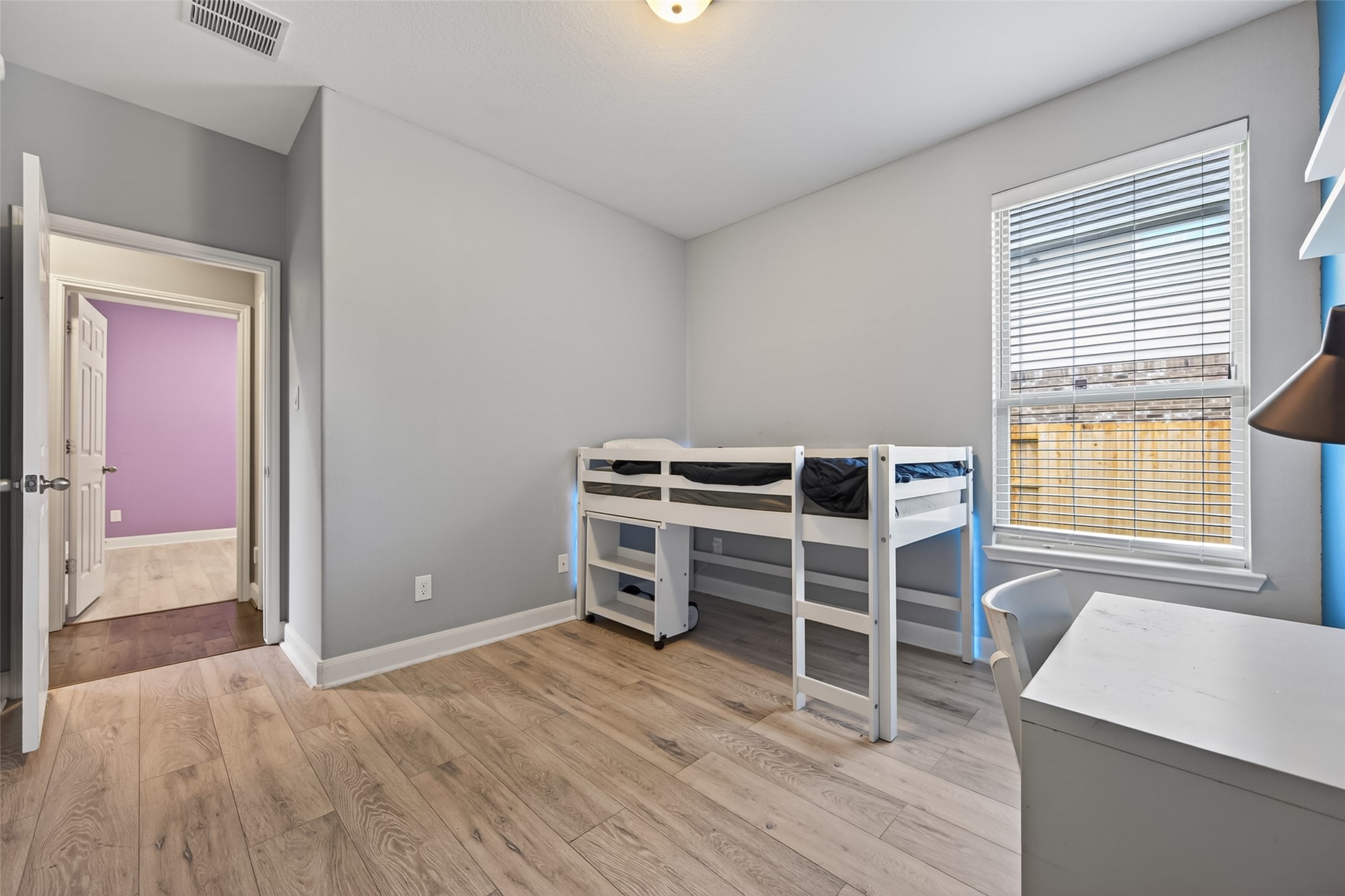 Secondary bedroom located rear of the home.