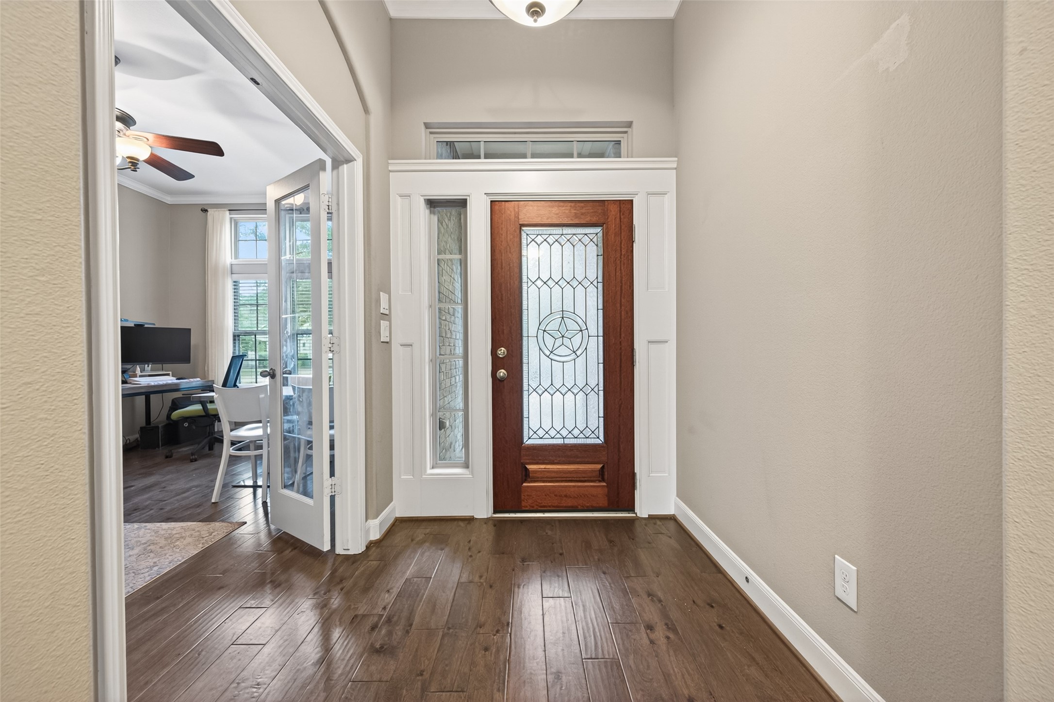 Welcome inside to the foyer with the oversized study and secondary bedroom as you enter