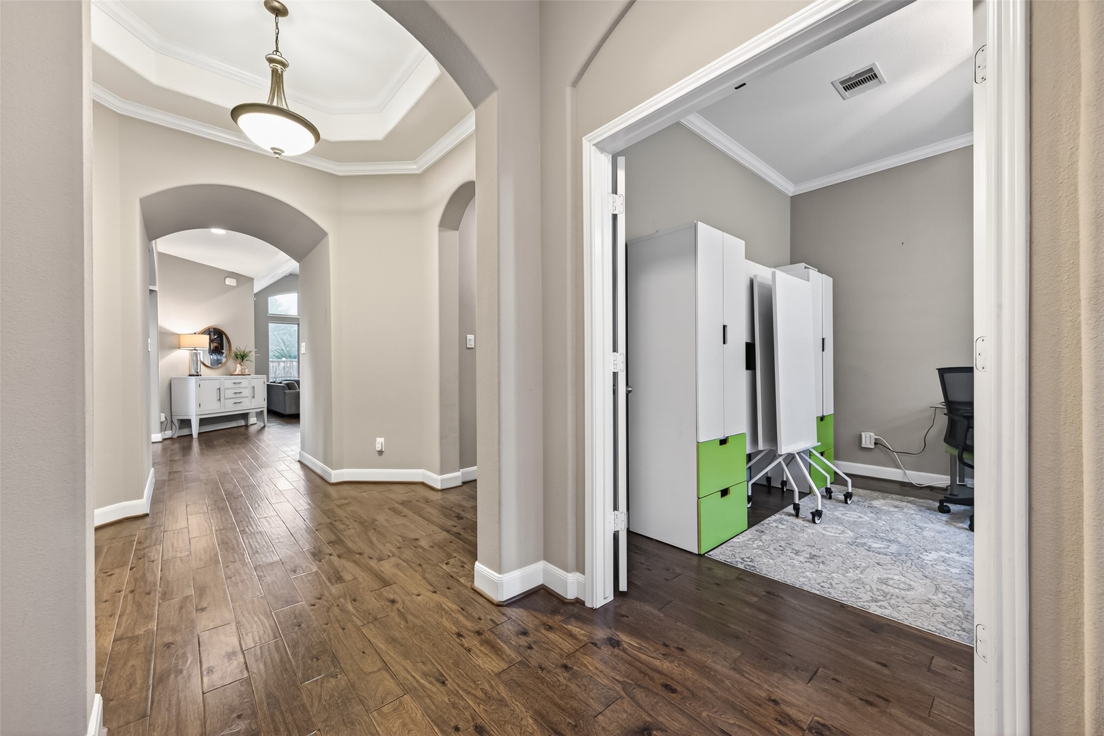 Welcome guests through this rotunda leading you to the main area and mud room to the garage