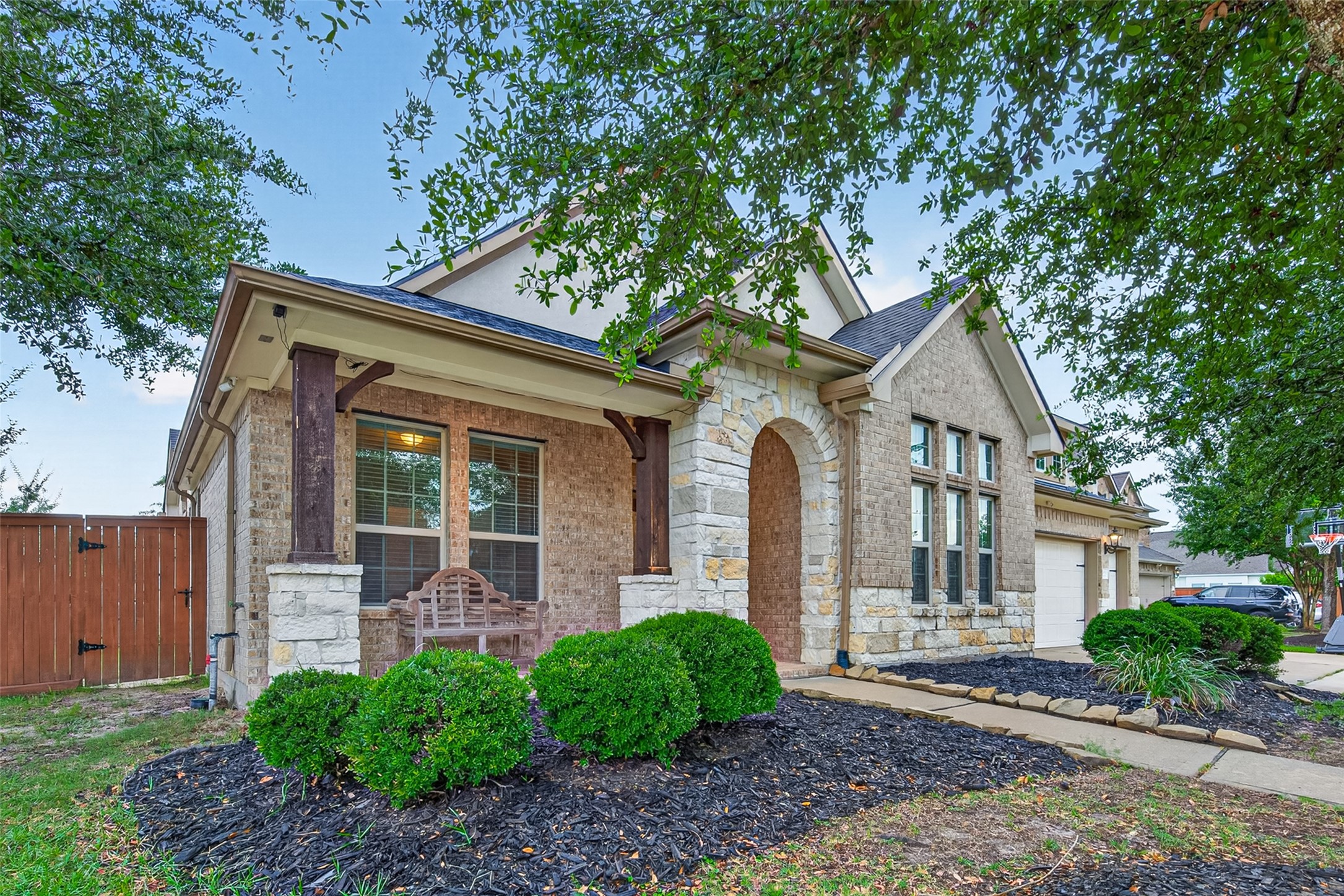 The property is laid with mature landscaping to provide great shade and curb appeal.