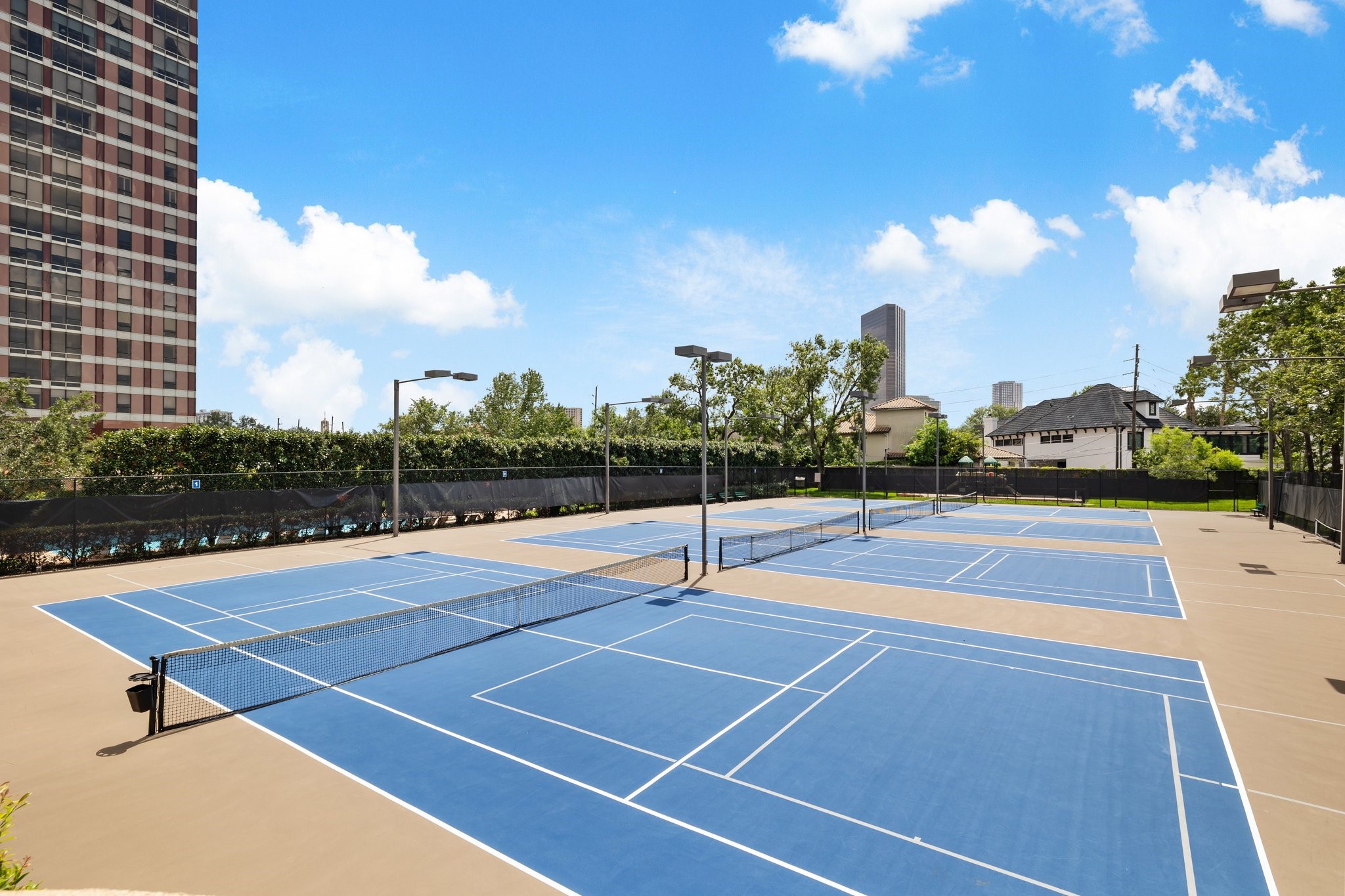 Total of 4 tennis courts. Two tennis courts accommodate pickleball as well.