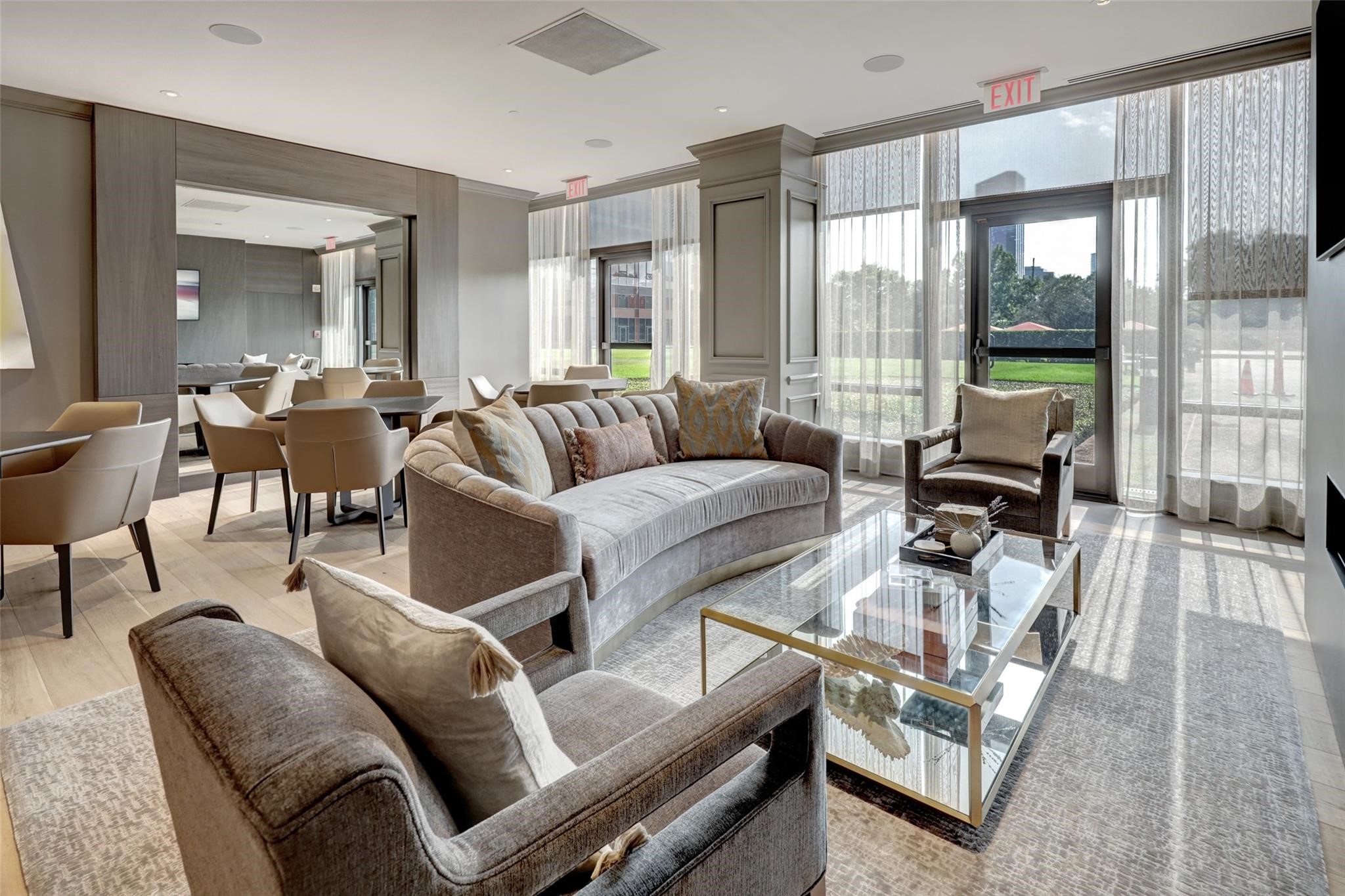 Lounging areas and card tables opening to the party room.