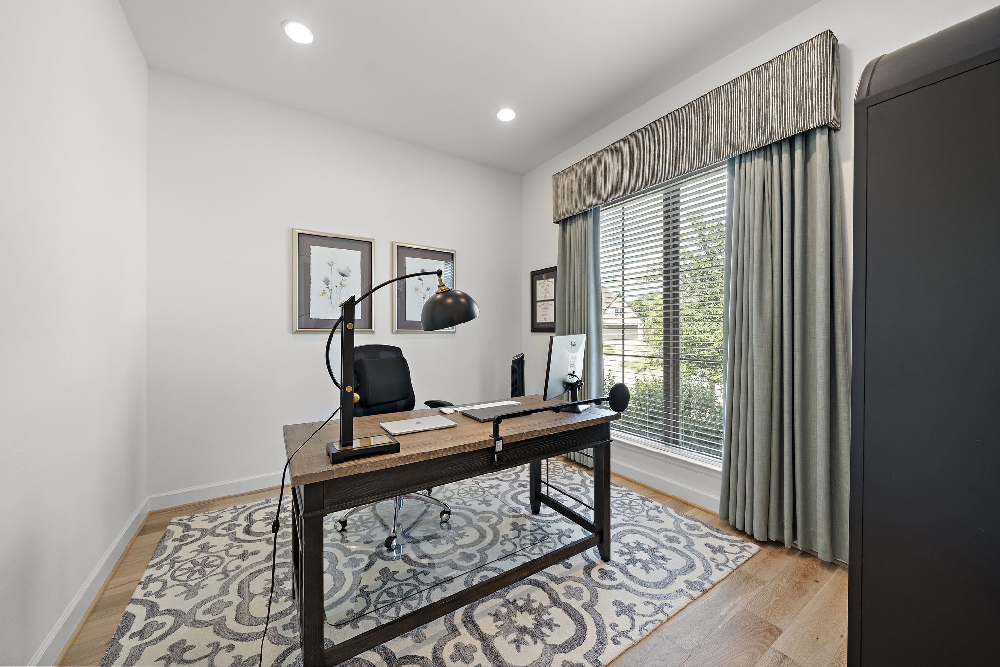 Designated study with french doors at the front of home