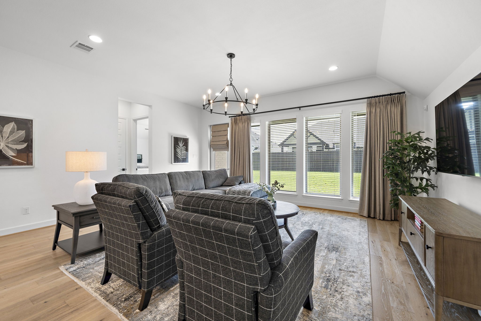 Large windows overlooking the backyard