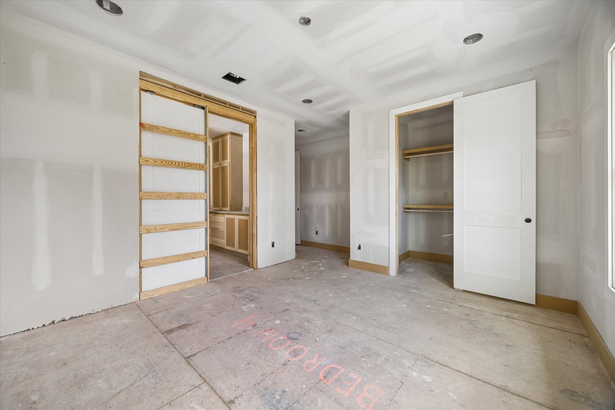 Bedroom 4 connects to the opposite side of the Jack and Jill bath and includes a dedicated closet with built in shelving. Additional built in shelves near the bath entrance make smart use of every inch for books, decor or everyday storage. **Current Construction as of 9/11/26