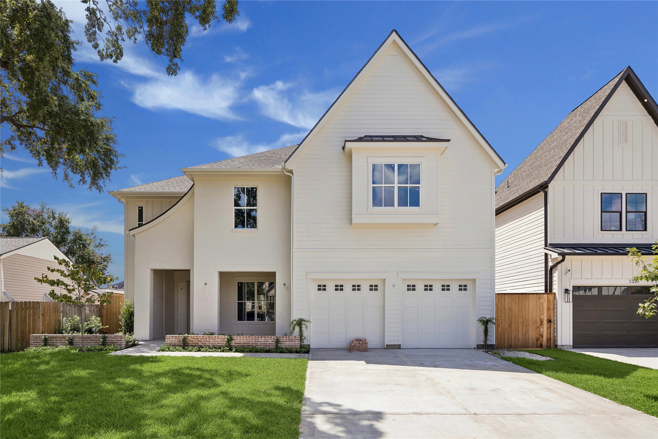 Clean architectural lines and a steep front gable give this Harvard Homes residence a timeless presence, while mixed exterior textures and a recessed entry add dimension and character. **Current Construction as of 9/11/26 Clean architectural lines and a steep front gable give this Harvard Homes residence a timeless presence, while mixed exterior textures and a recessed entry add dimension and character. **Current Construction as of 9/11/26
