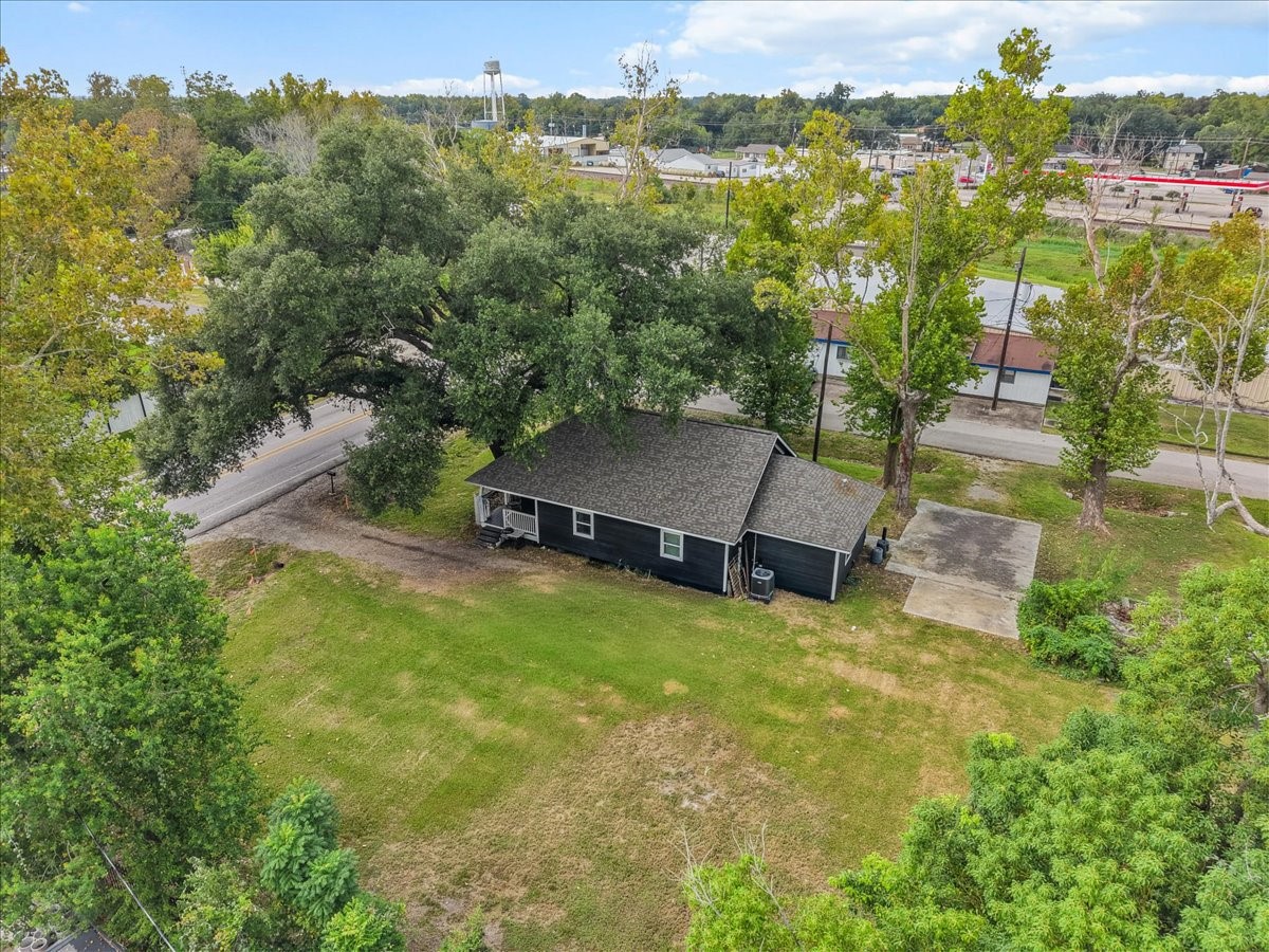 A generous yard, mature trees, and two porches give this property plenty of outdoor charm. Whether you're sipping your morning coffee on the porch or envisioning a future pool or shop, this property offers room to make it your own.