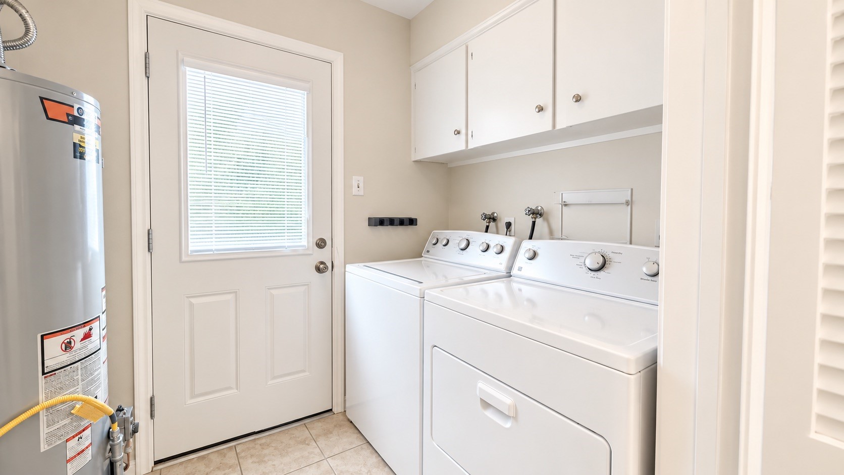 Utility area. Washer and dryer are included.
