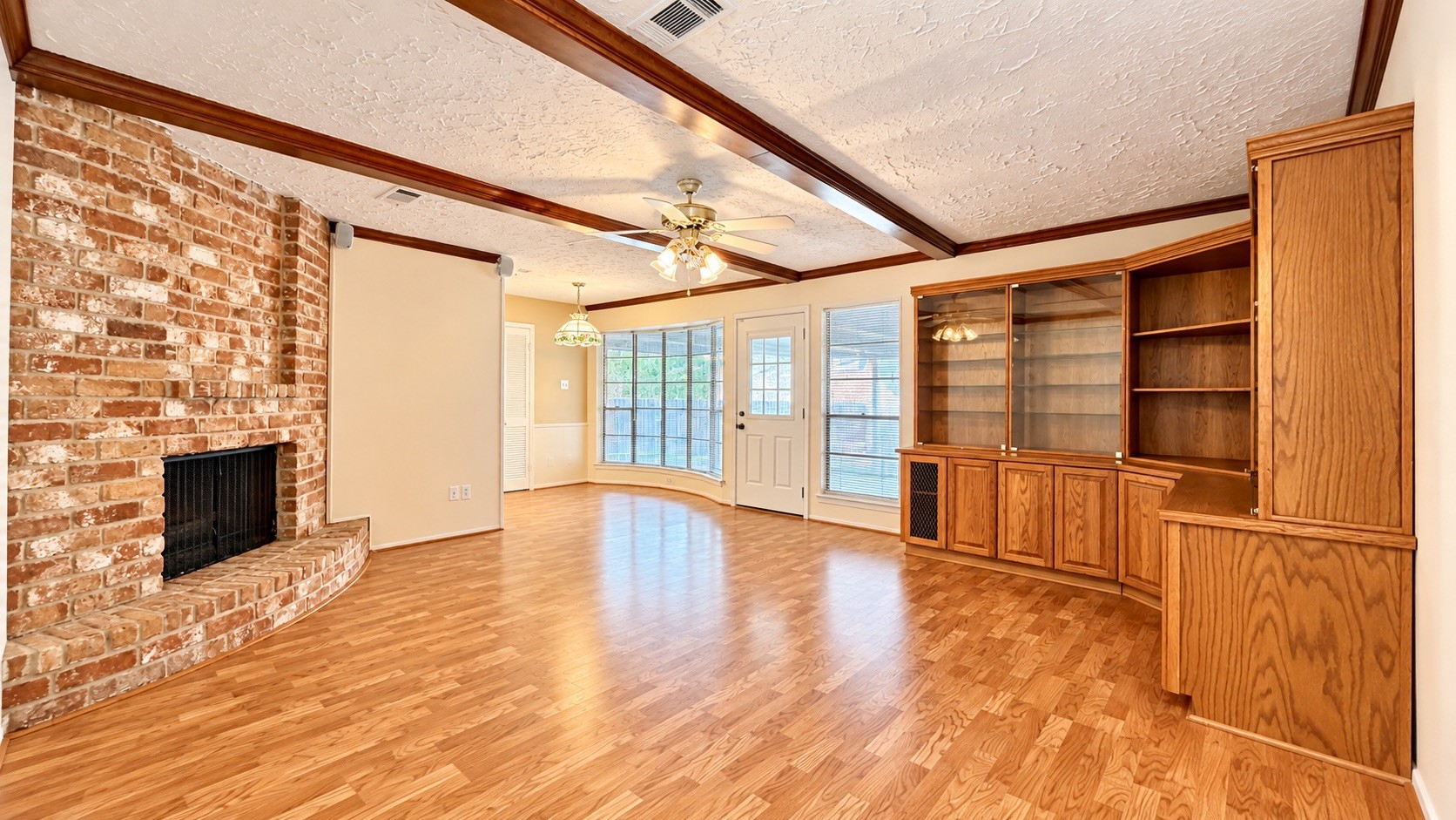 Living room with wood flooring.